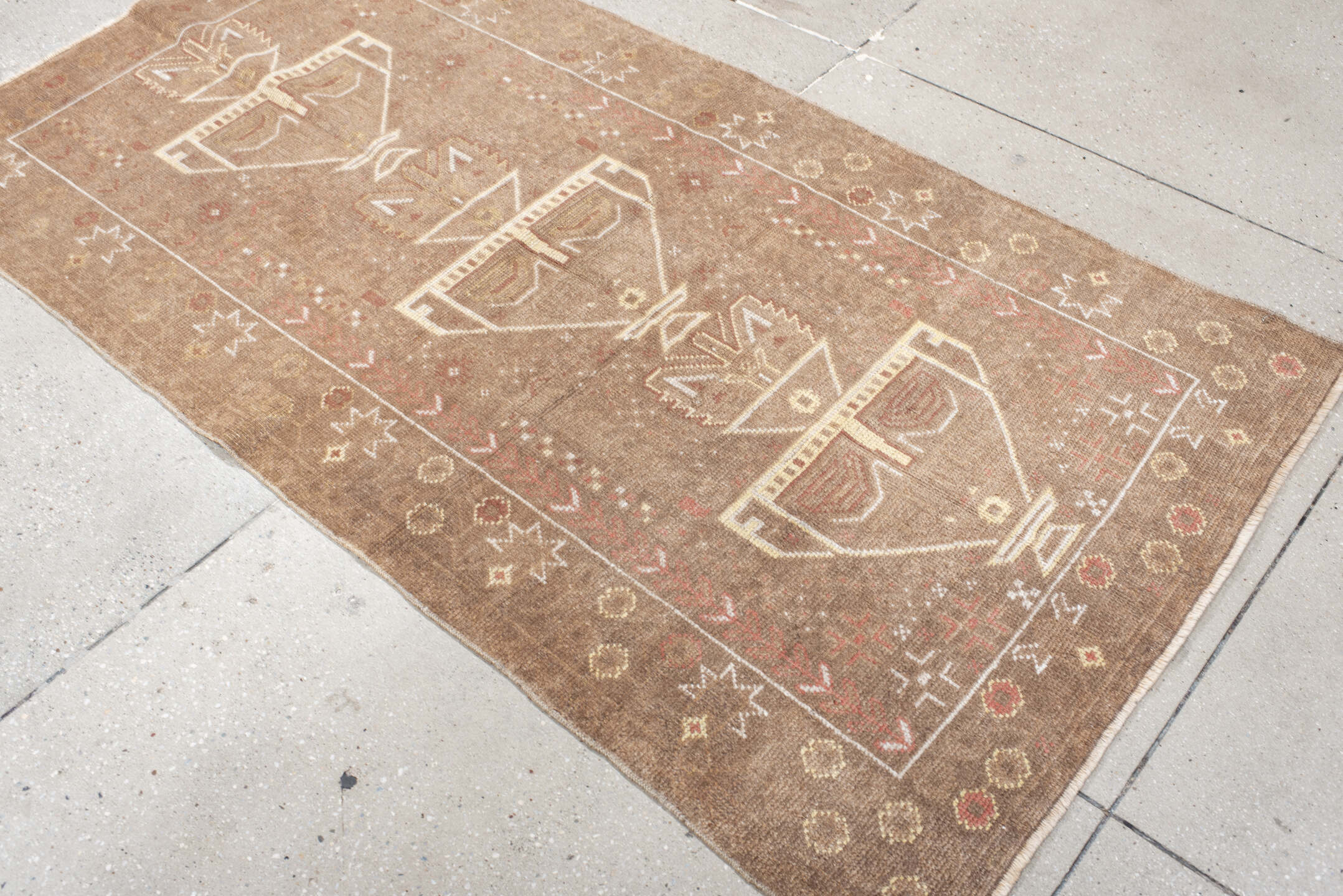 3' x 6' one-of-a-kind handmade antique Belouch small size rug. Color palette: camel, ivory, taupe, rose, rust, beige, gray