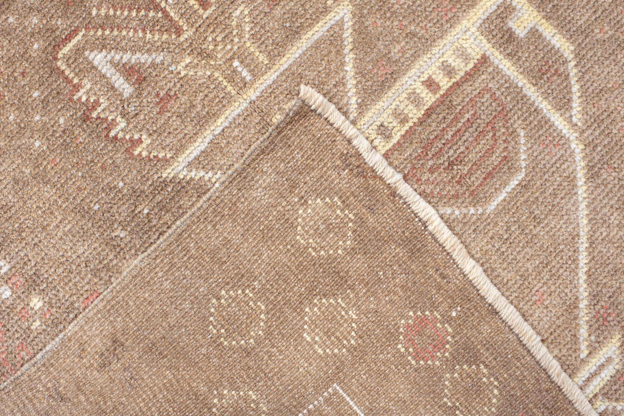 3' x 6' one-of-a-kind handmade antique Belouch small size rug. Color palette: camel, ivory, taupe, rose, rust, beige, gray