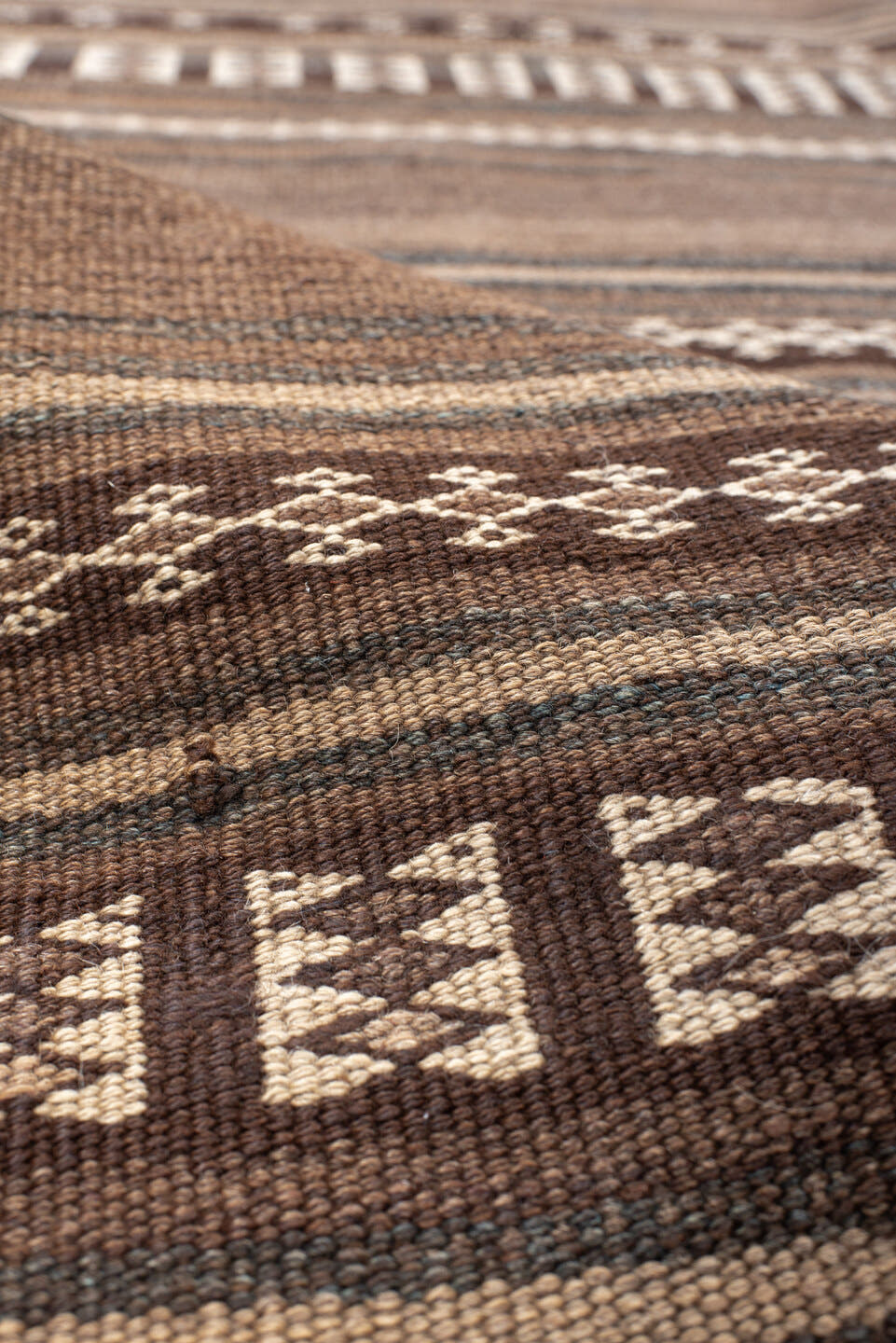 4' x 12' one-of-a-kind handmade antique Kilim runner rug. Color palette: brown, taupe, charcoal, ivory, camel, slate, beige