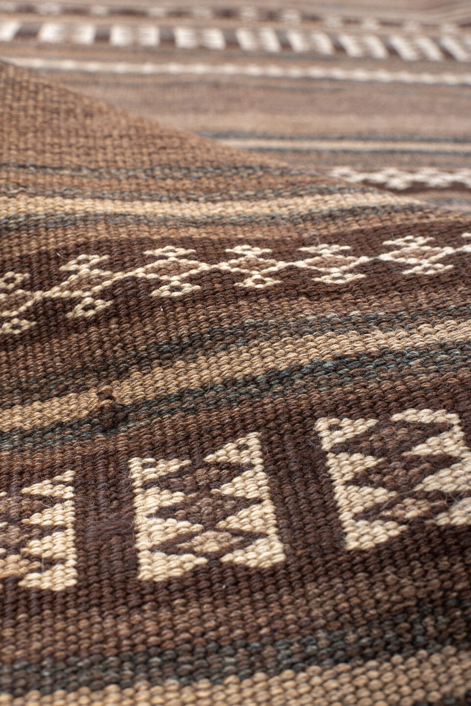 4' x 12' one-of-a-kind handmade antique Kilim runner rug. Color palette: brown, taupe, charcoal, ivory, camel, slate, beige