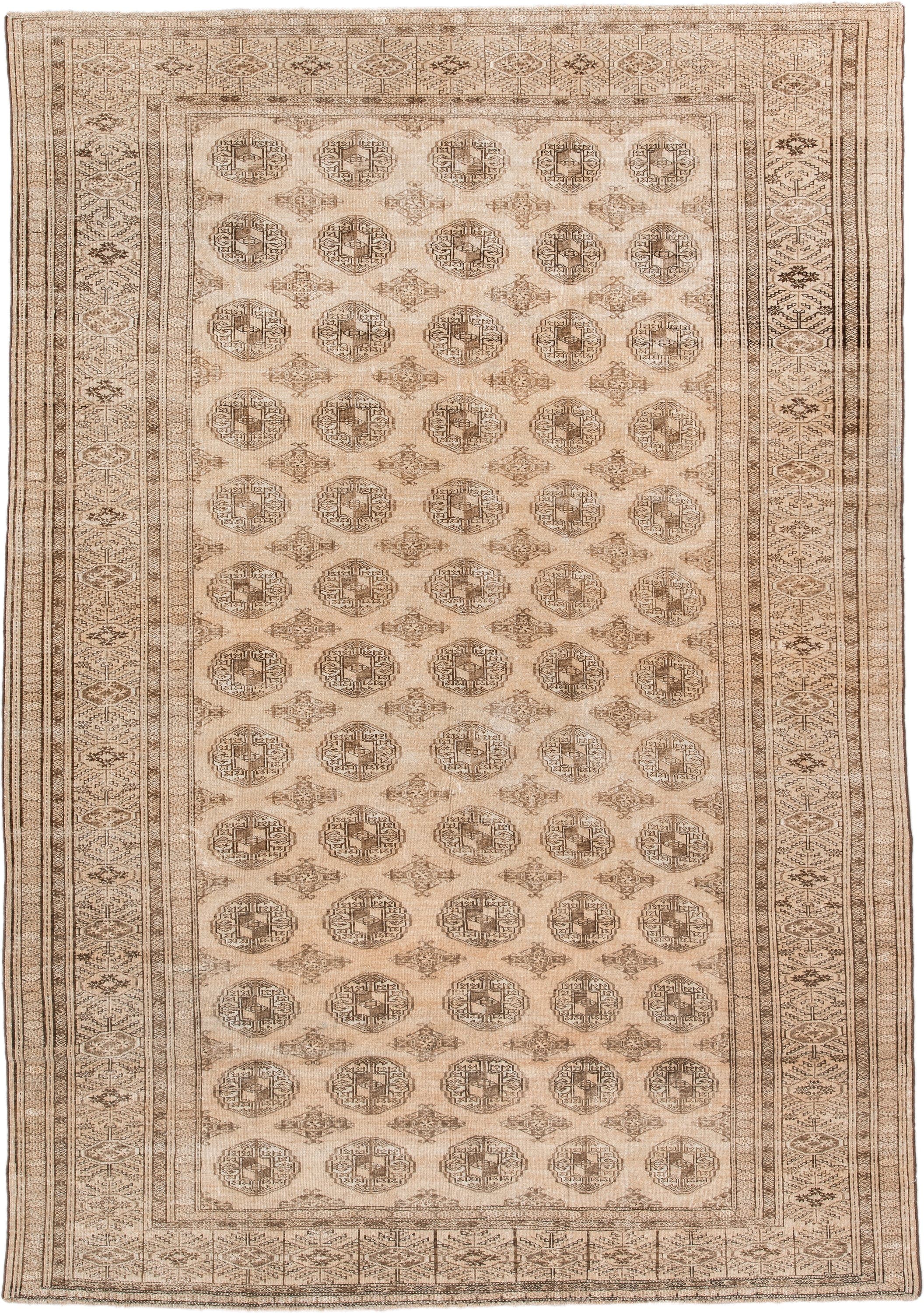 6' x 9' one-of-a-kind handmade antique Bokara medium size rug. Color palette: ivory, taupe, camel, beige, brown, gray