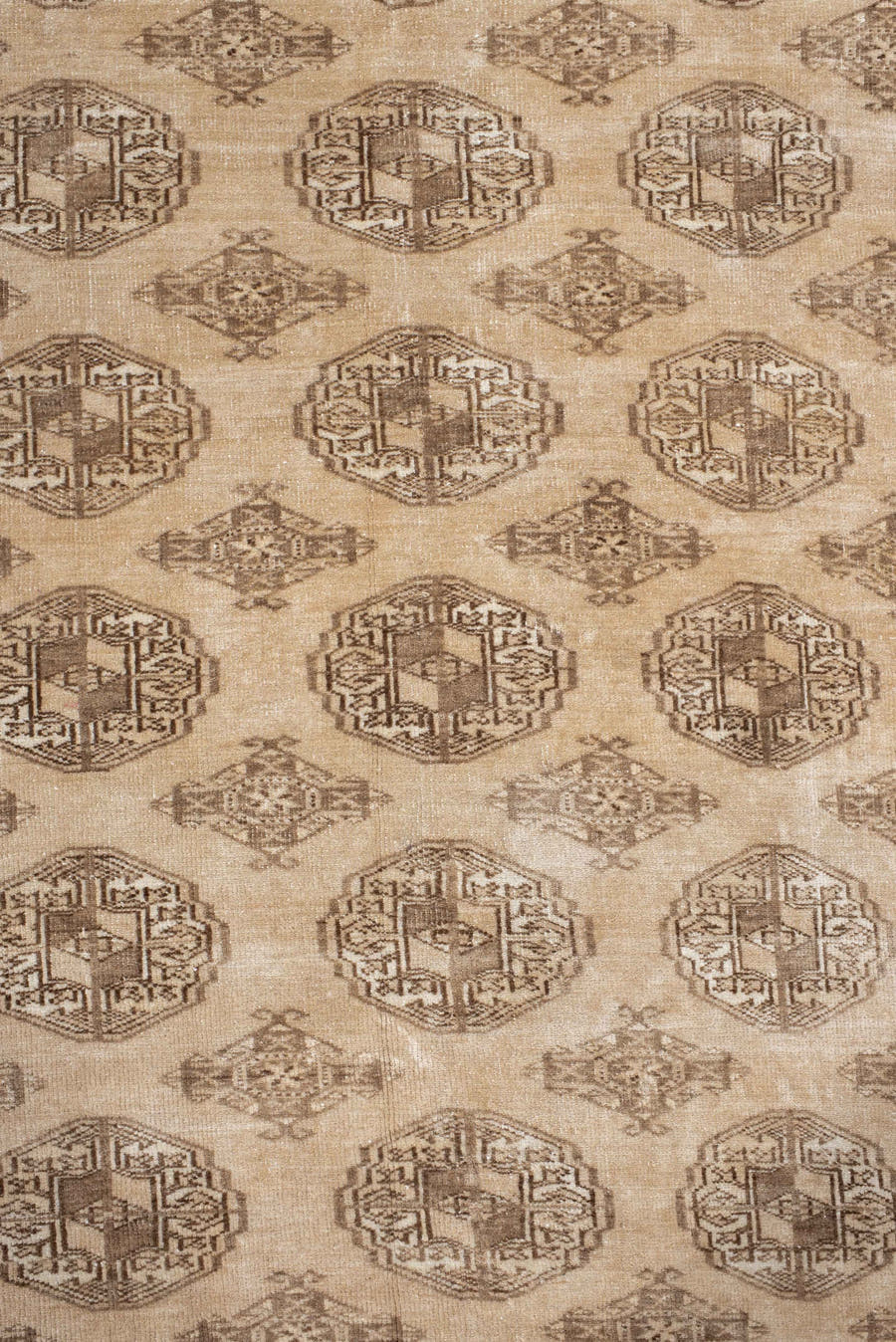 6' x 9' one-of-a-kind handmade antique Bokara medium size rug. Color palette: ivory, taupe, camel, beige, brown, gray