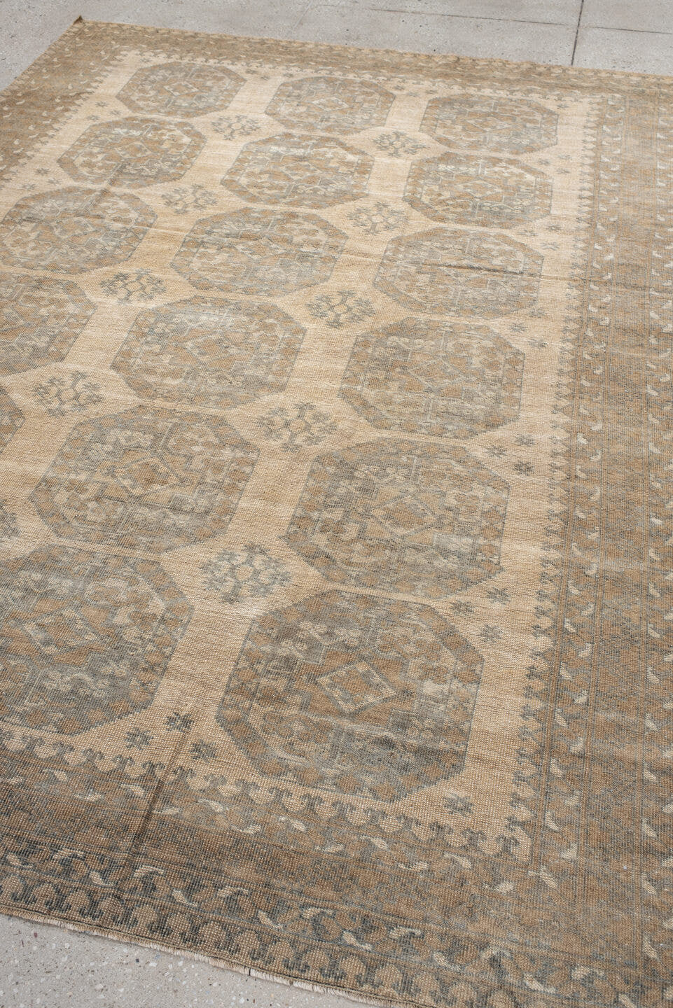 6' x 9' one-of-a-kind handmade antique Afghan rug. Color palette: ivory, taupe, beige, camel, sage, brown, gray, green