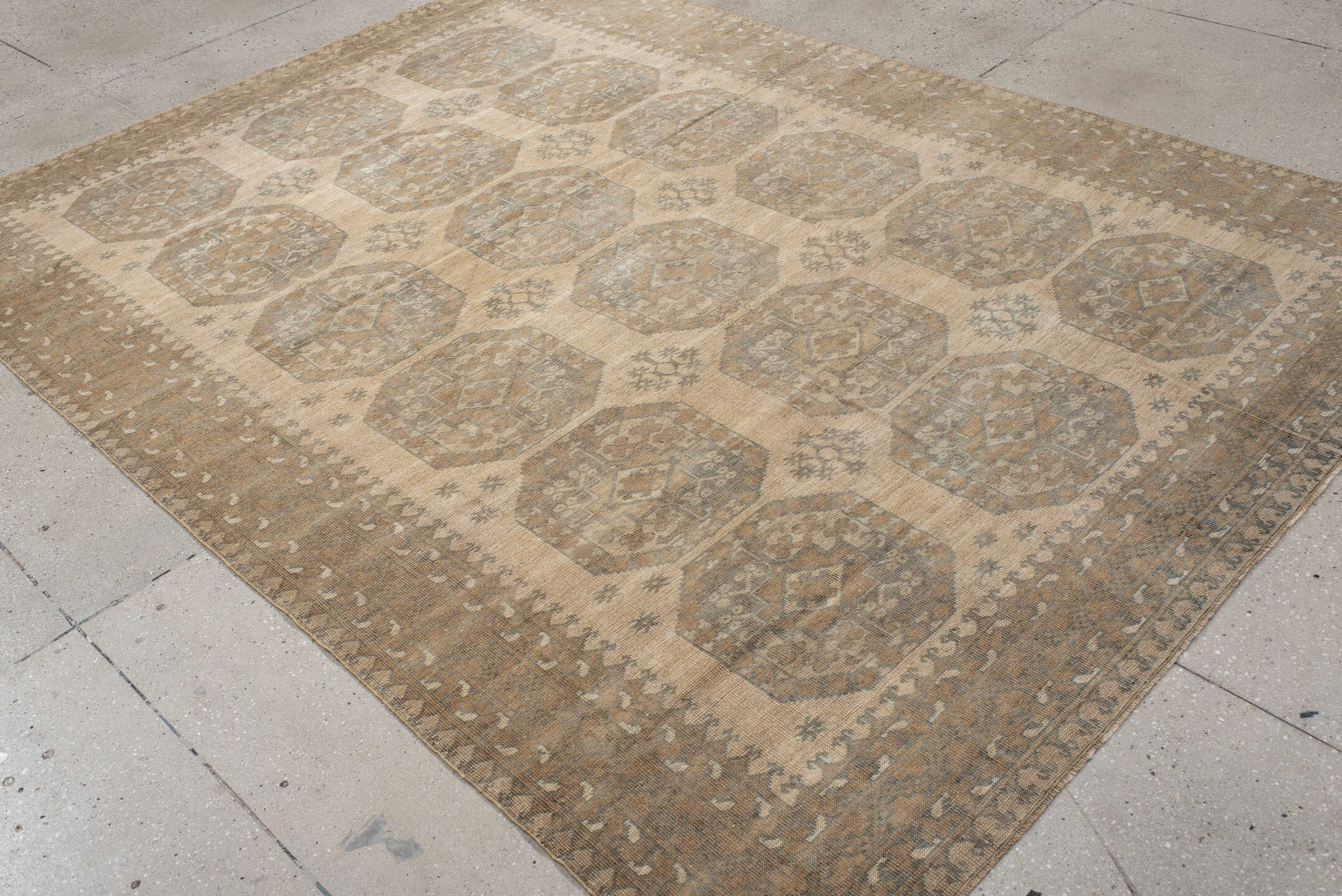 6' x 9' one-of-a-kind handmade antique Afghan rug. Color palette: ivory, taupe, beige, camel, sage, brown, gray, green