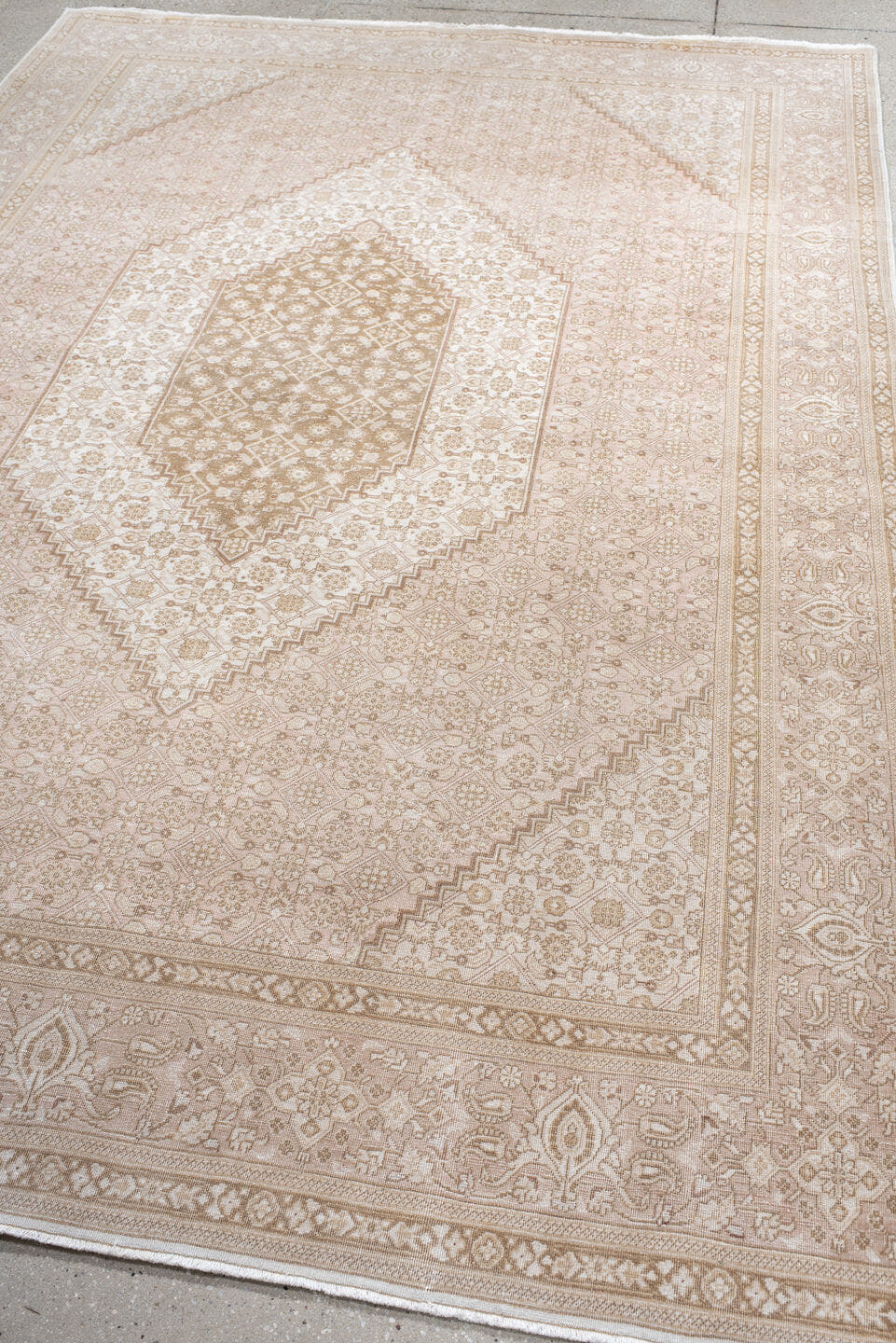 6' x 9' one-of-a-kind handmade vintage Tabriz medium size rug. Color palette: ivory, blush, taupe, beige, sand, pink, gray