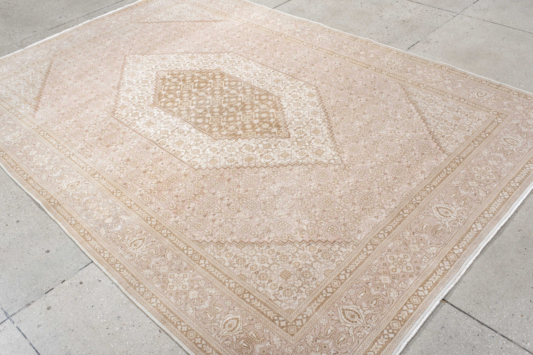 6' x 9' one-of-a-kind handmade vintage Tabriz medium size rug. Color palette: ivory, blush, taupe, beige, sand, pink, gray