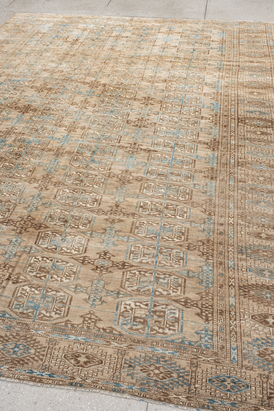 7' x 10' one-of-a-kind handmade antique Bokara large size rug. Color palette: ivory, taupe, camel, pale blue, brown, beige