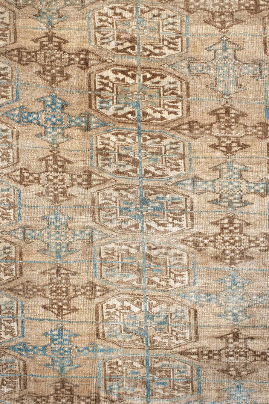7' x 10' one-of-a-kind handmade antique Bokara large size rug. Color palette: ivory, taupe, camel, pale blue, brown, beige