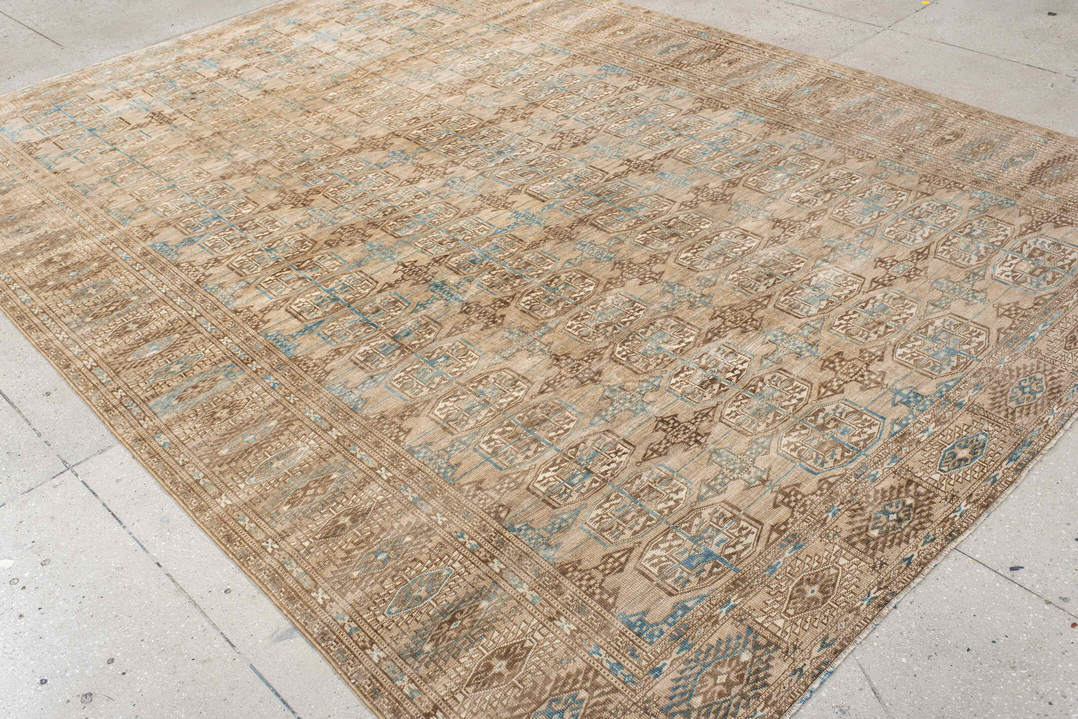 7' x 10' one-of-a-kind handmade antique Bokara large size rug. Color palette: ivory, taupe, camel, pale blue, brown, beige