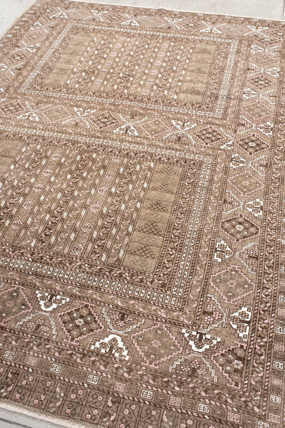 5' x 7' one-of-a-kind handmade vintage  rug. Color palette: taupe, brown, ivory, blush, camel, beige, gray, pink