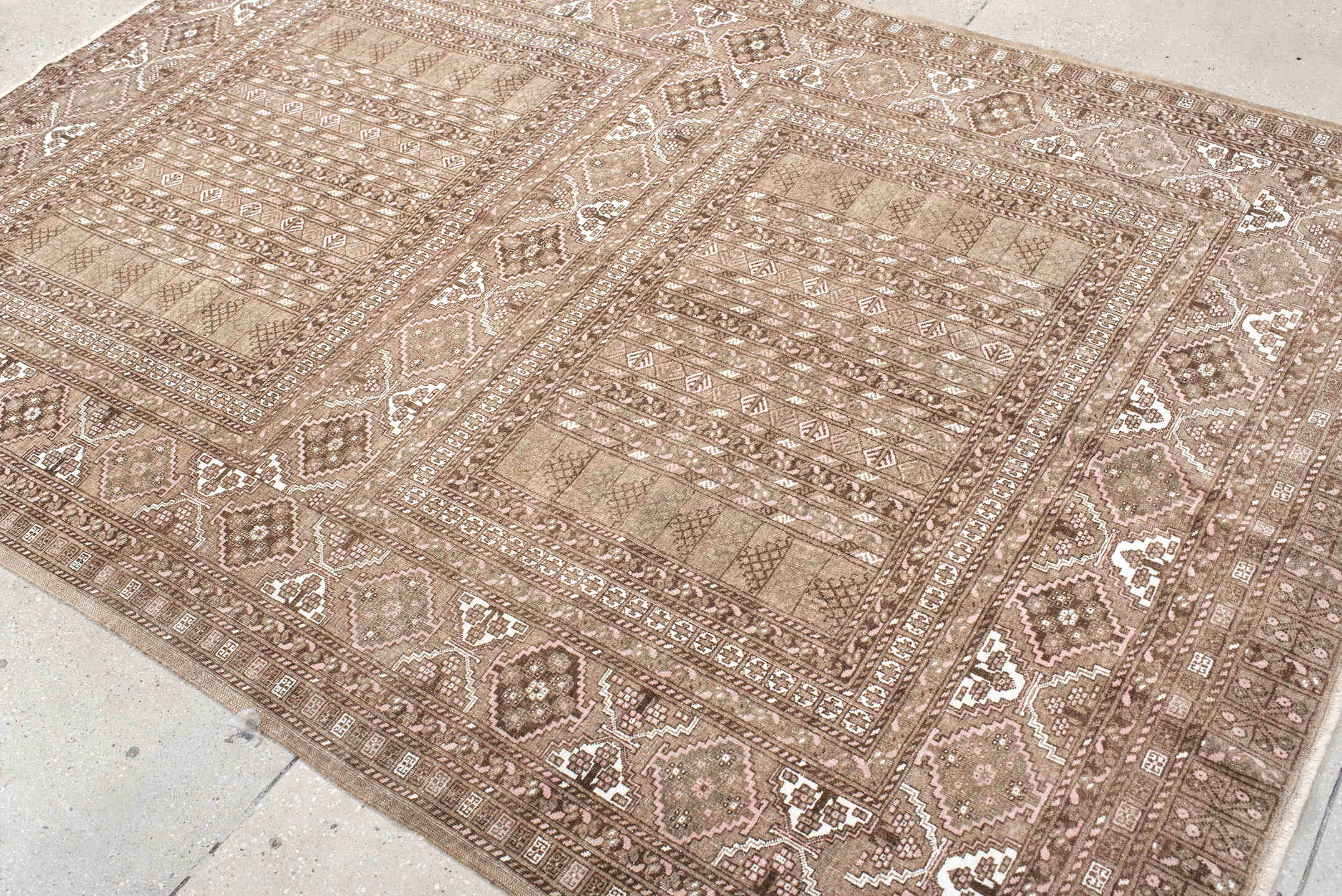 5' x 7' one-of-a-kind handmade vintage  rug. Color palette: taupe, brown, ivory, blush, camel, beige, gray, pink