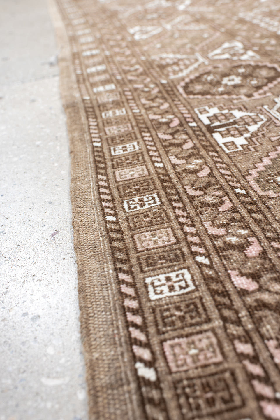 5' x 7' one-of-a-kind handmade vintage  rug. Color palette: taupe, brown, ivory, blush, camel, beige, gray, pink