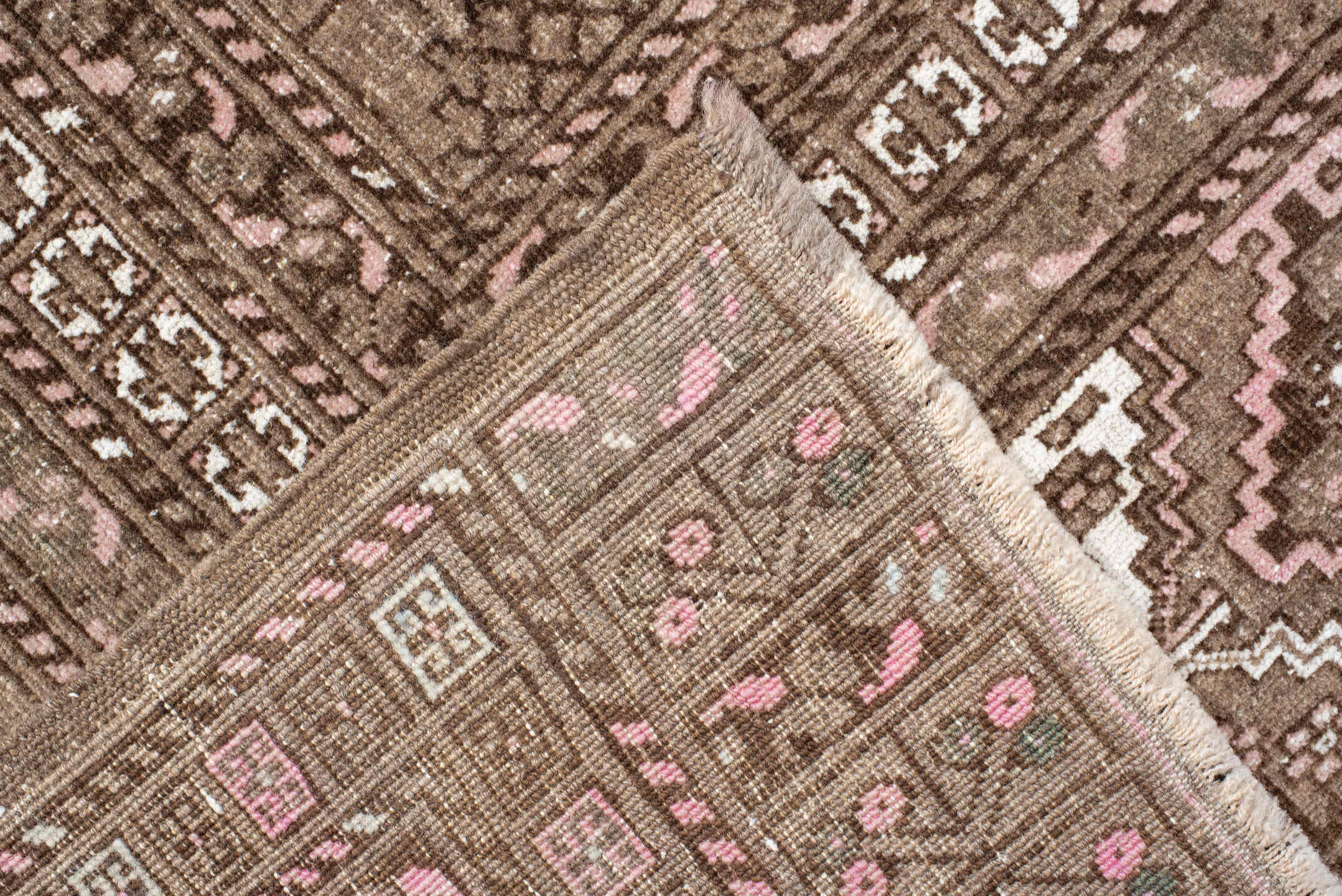 5' x 7' one-of-a-kind handmade vintage  rug. Color palette: taupe, brown, ivory, blush, camel, beige, gray, pink