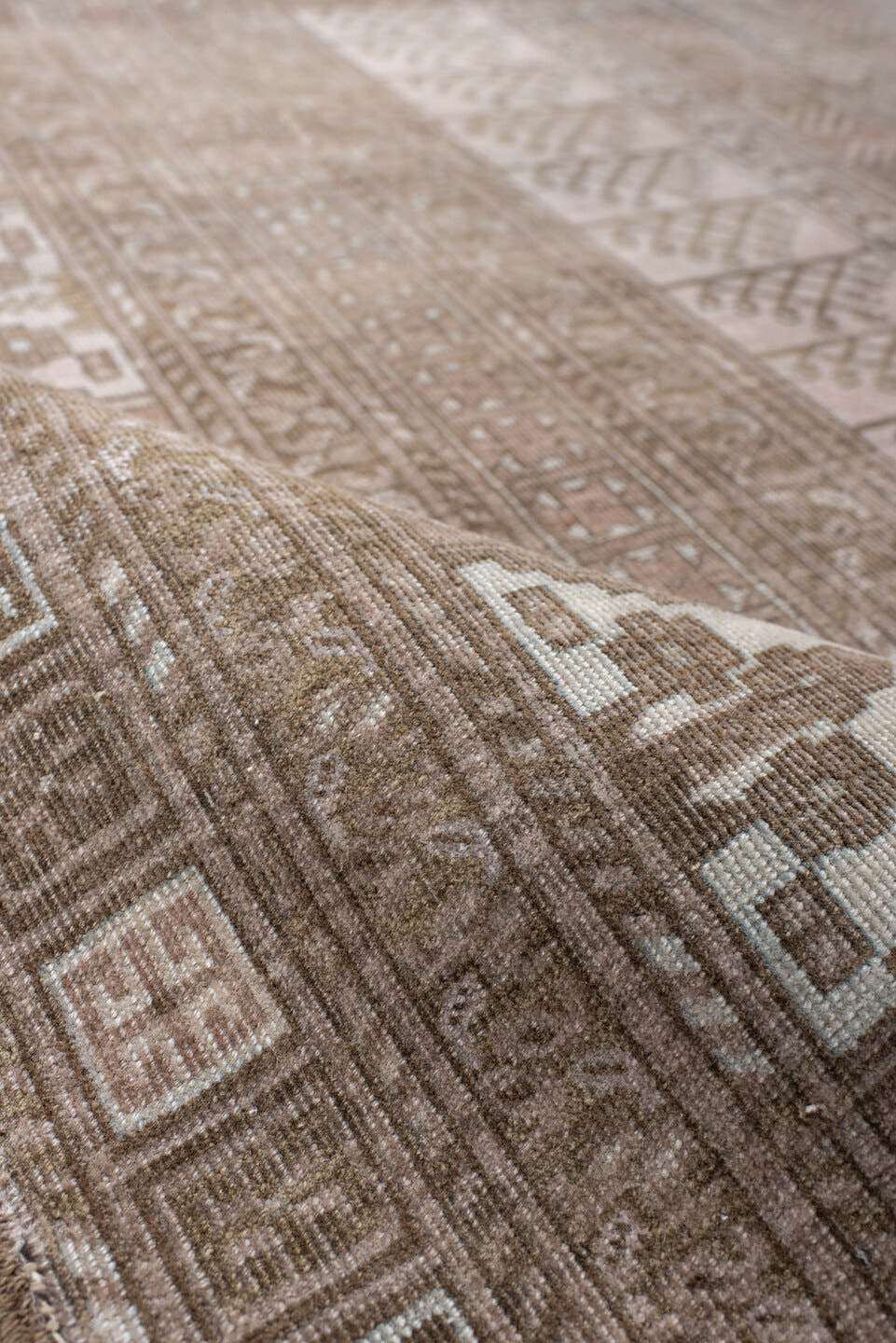 5' x 9' one-of-a-kind handmade antique Afghan medium size rug. Color palette: taupe, ivory, camel, brown, rose, beige, gray