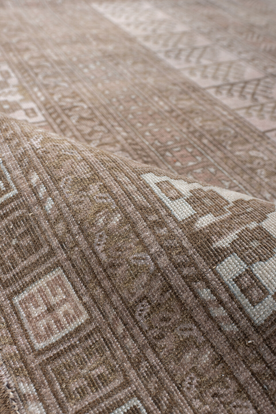 5' x 9' one-of-a-kind handmade antique Afghan medium size rug. Color palette: taupe, ivory, camel, brown, rose, beige, gray