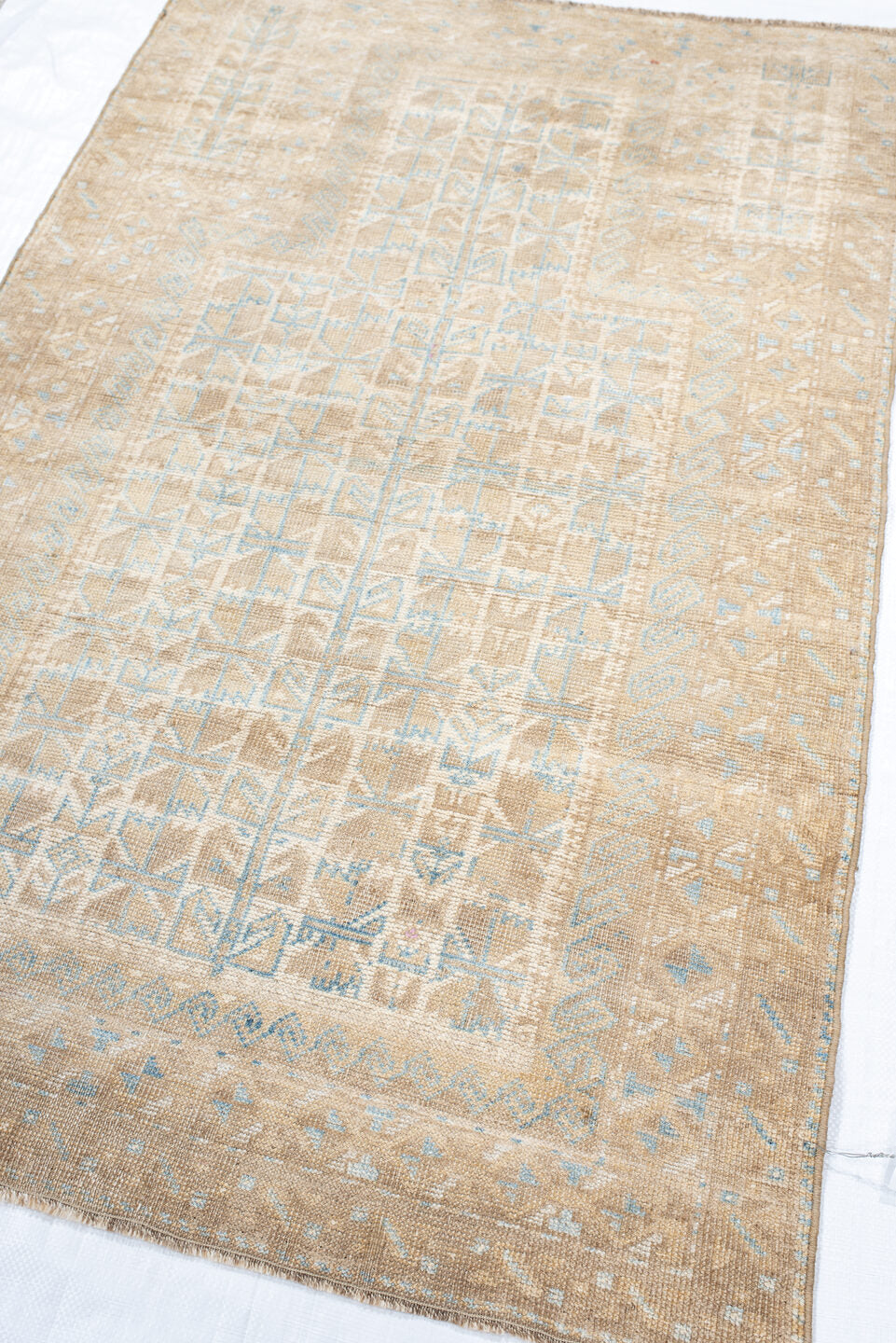 3' x 4' one-of-a-kind handmade vintage Belouch small size rug. Color palette: beige, ivory, light blue, taupe, gray
