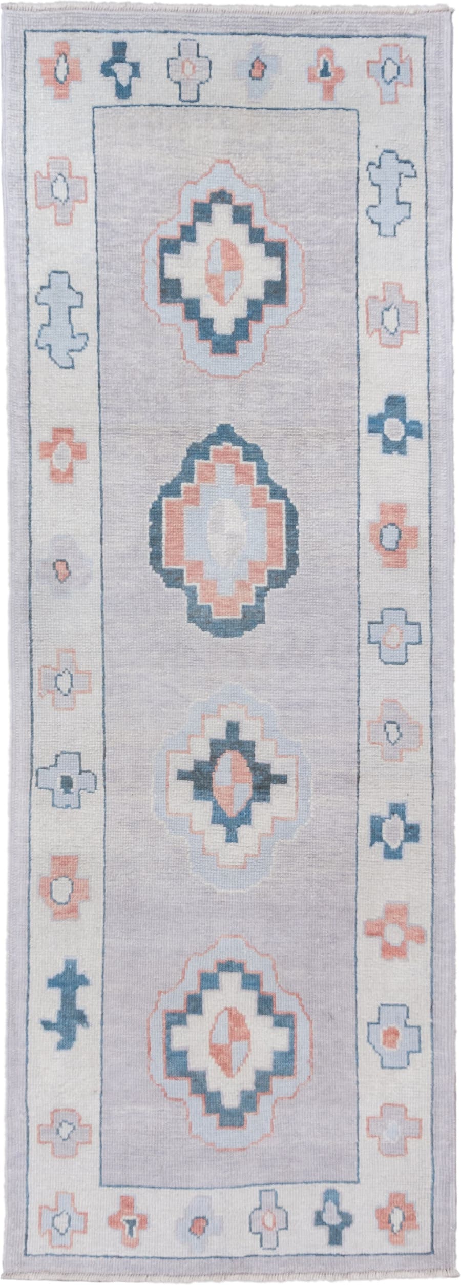 3' x 9' one-of-a-kind handmade vintage Oushak runner rug. Color palette: ivory, pale blue, blush, slate, taupe, light blue