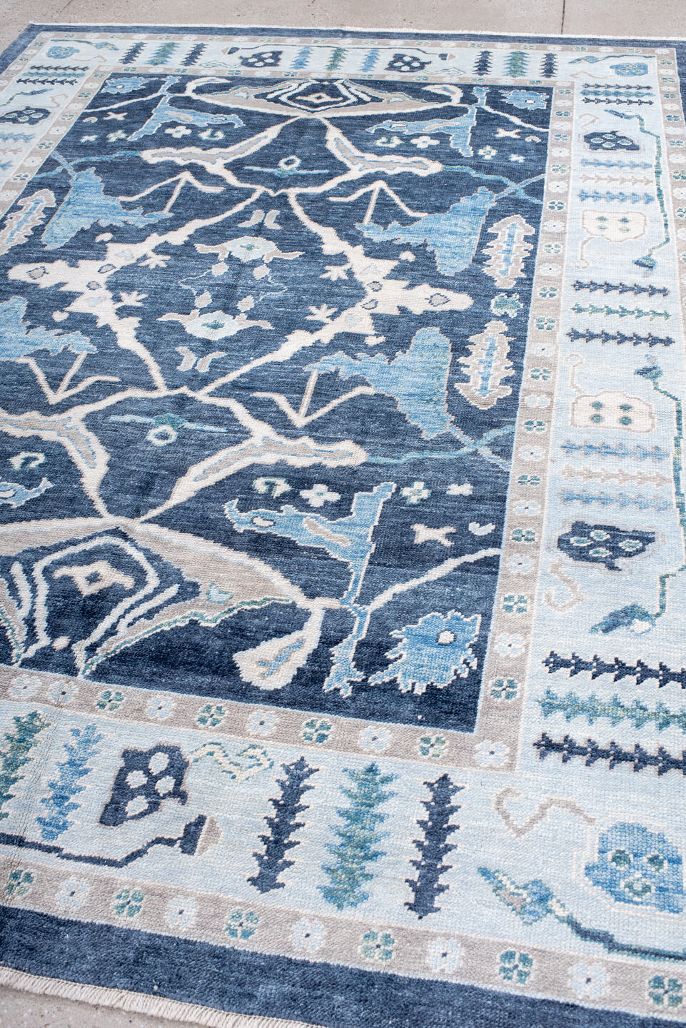 7' x 10' one-of-a-kind handmade vintage Oushak large size rug. Color palette: navy, ivory, sky blue, taupe, slate, aqua