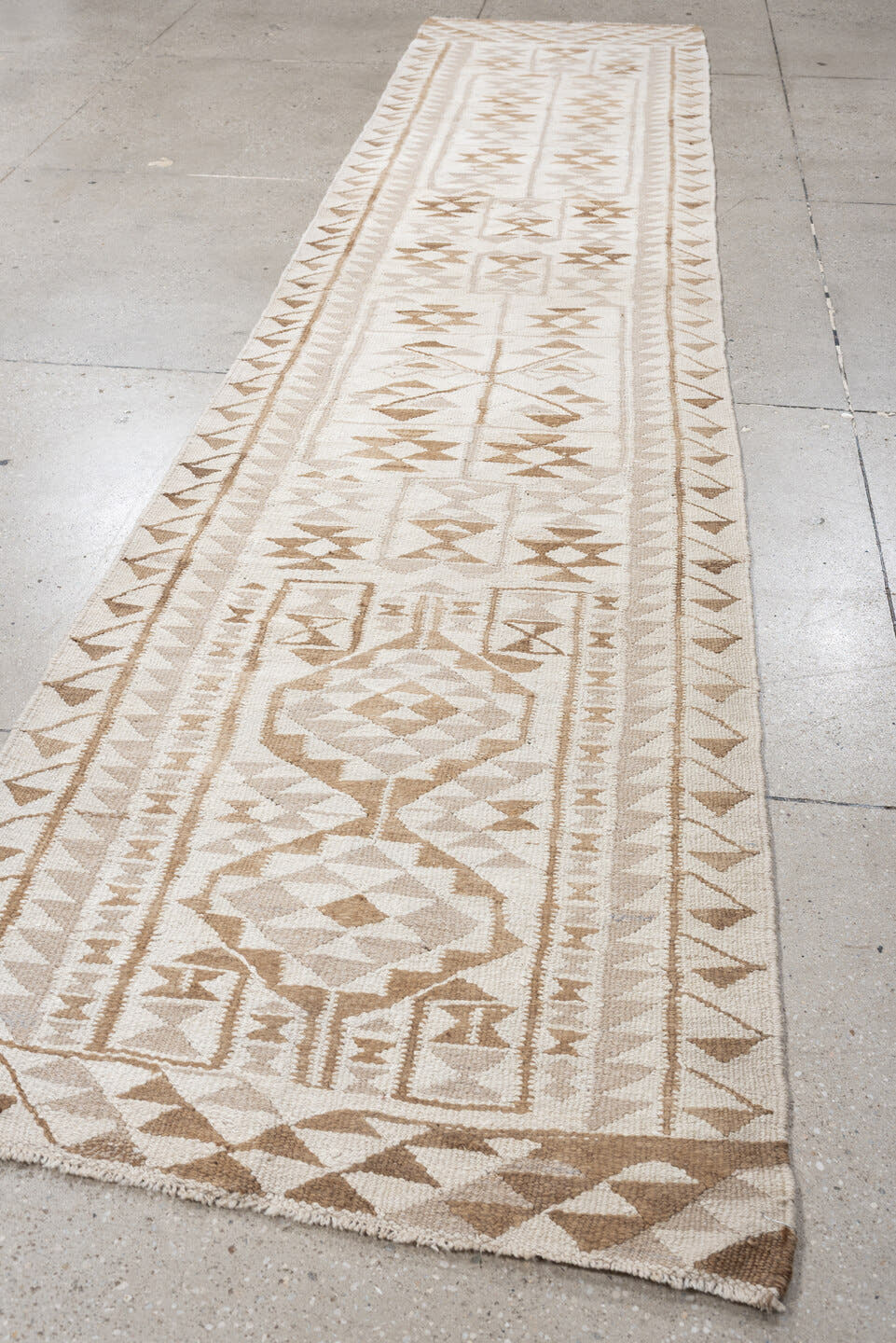 3' x 12' one-of-a-kind handmade antique Kilim runner rug. Color palette: ivory, camel, taupe, sand, beige, gray