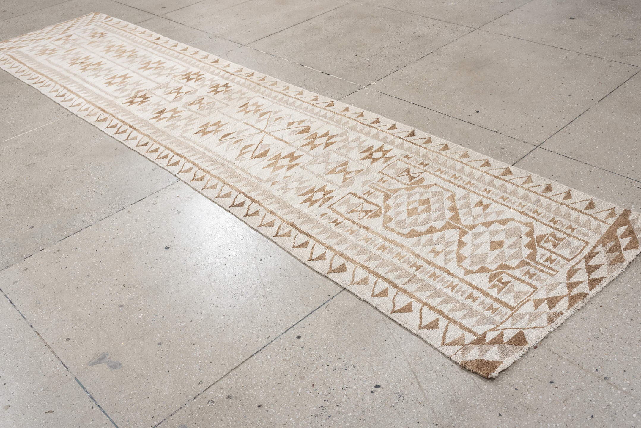 3' x 12' one-of-a-kind handmade antique Kilim runner rug. Color palette: ivory, camel, taupe, sand, beige, gray