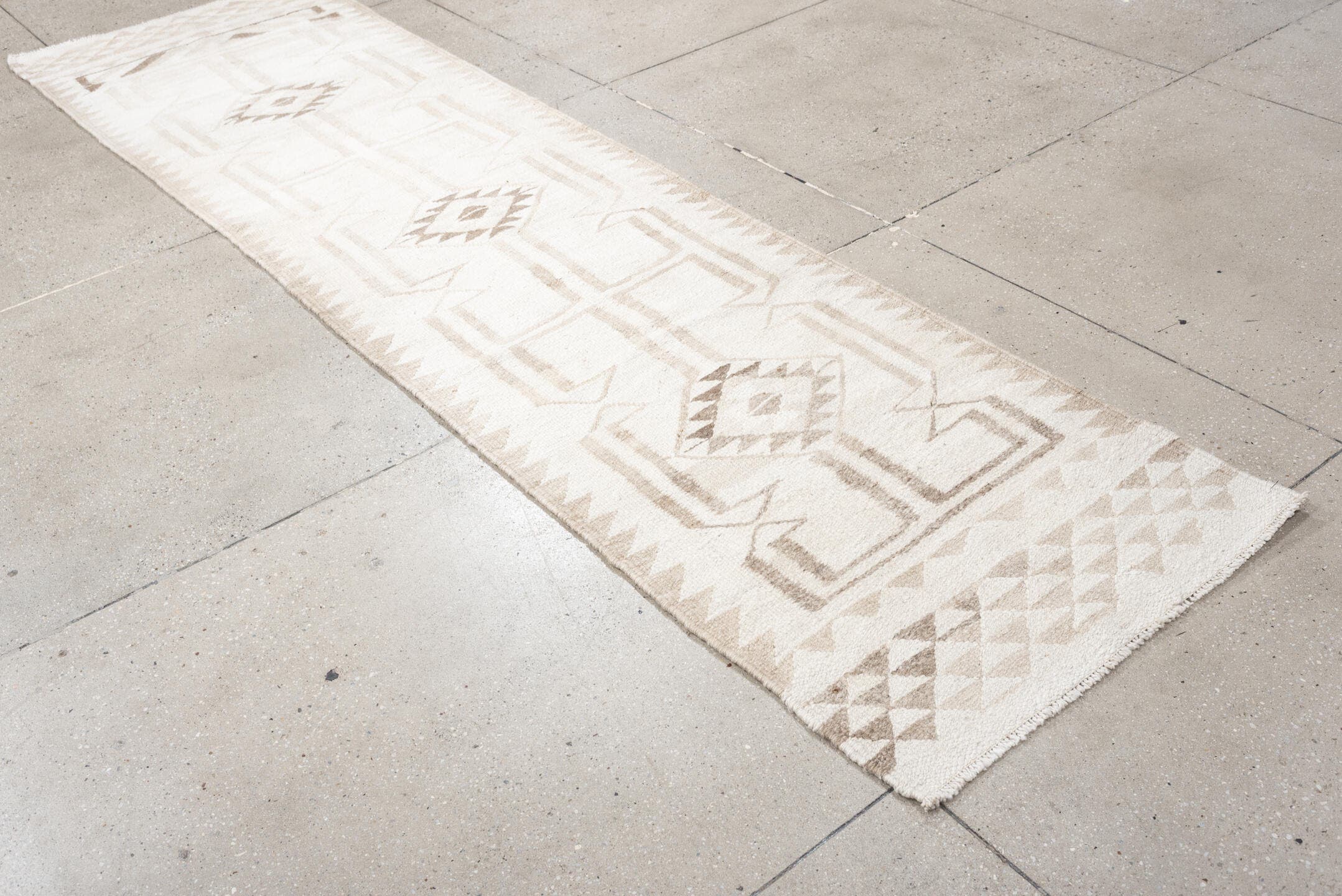 2' x 10' one-of-a-kind handmade antique Kilim runner rug. Color palette: ivory, taupe, beige, sand, gray