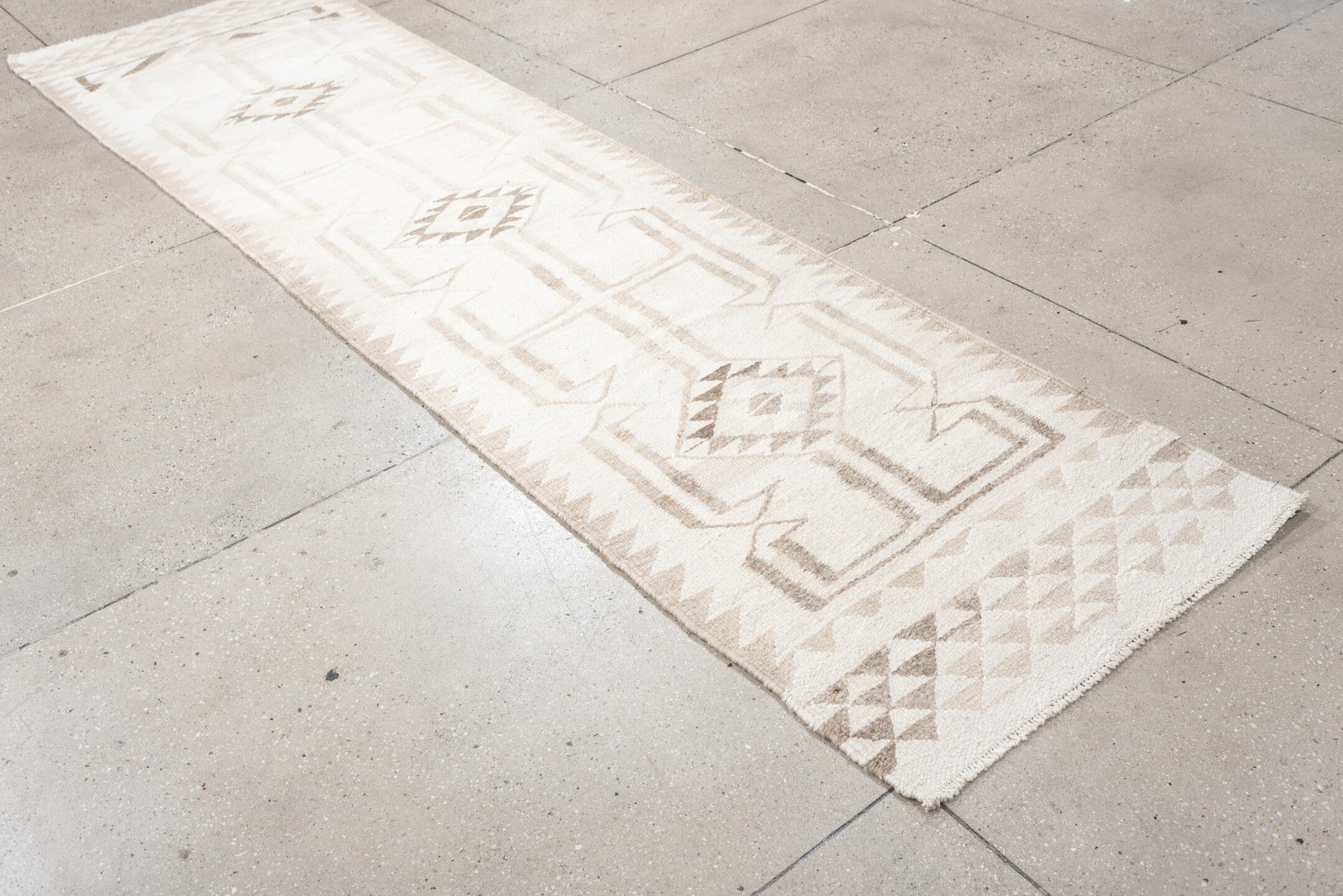 2' x 10' one-of-a-kind handmade antique Kilim runner rug. Color palette: ivory, taupe, beige, sand, gray
