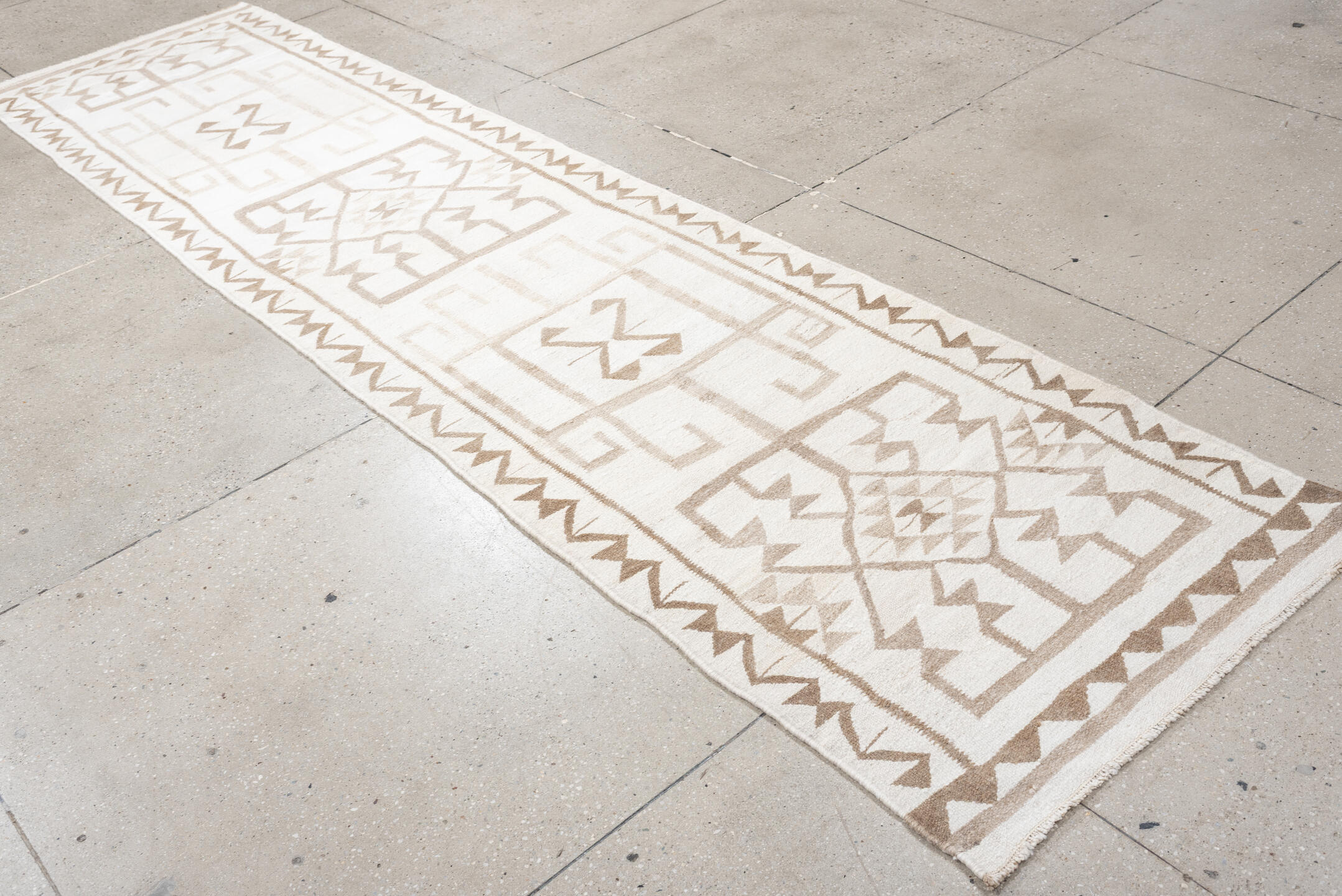 2' x 11' one-of-a-kind handmade antique Kilim runner rug. Color palette: ivory, taupe, beige, sand, gray