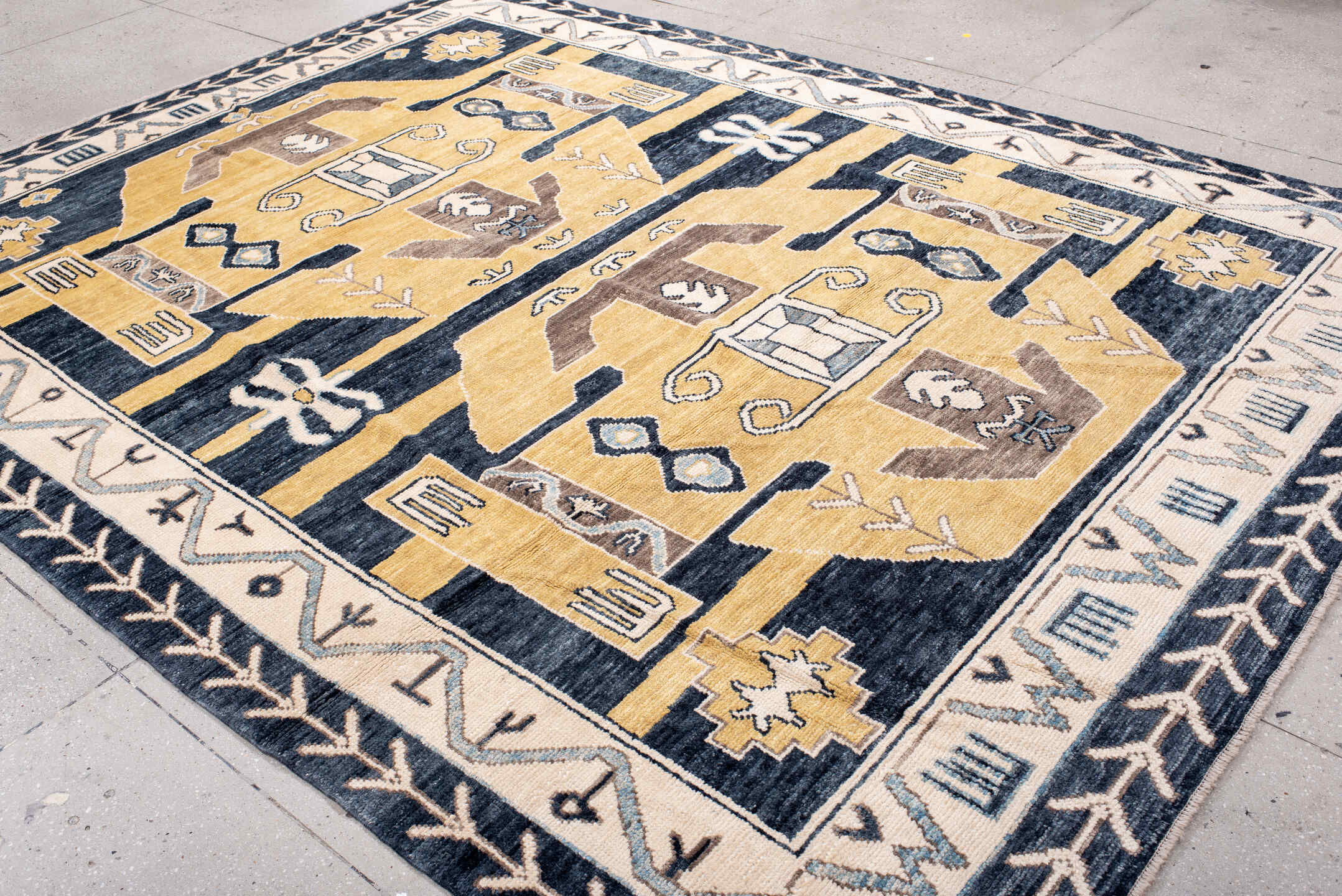 8' x 11' one-of-a-kind handmade vintage Kars large size rug. Color palette: navy, gold, ivory, taupe, slate, camel, blue