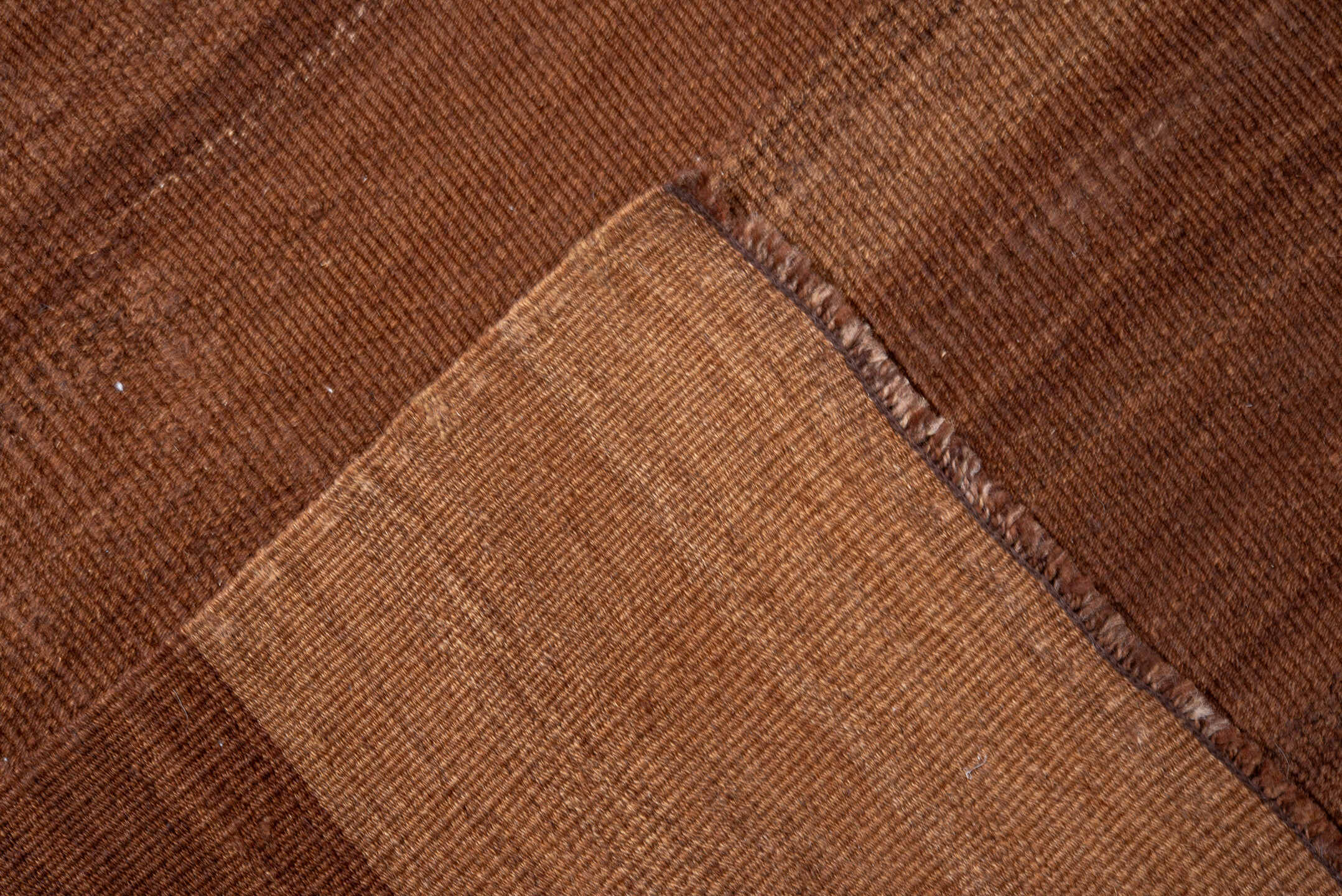 7' x 9' one-of-a-kind handmade vintage Kilim rug. Color palette: brown, pink, redwood