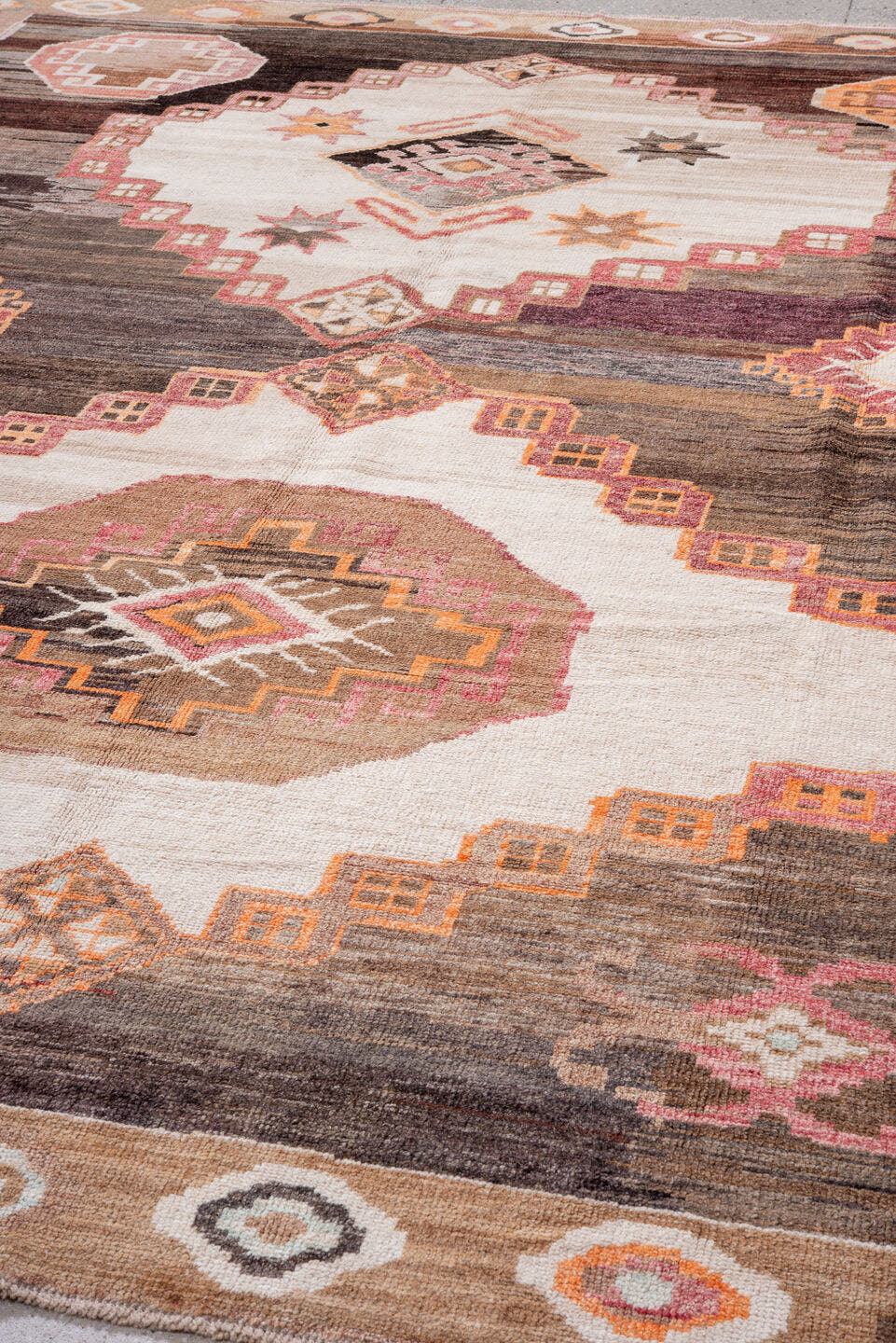 10' x 12' one-of-a-kind handmade vintage Kars large size rug. Color palette: brown, ivory, taupe, rose, rust, charcoal