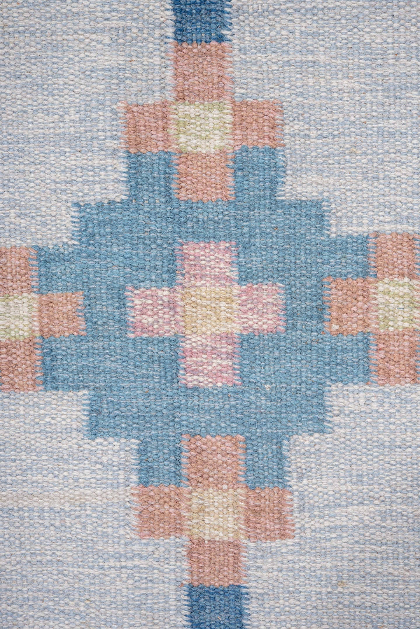 6' x 9' one-of-a-kind handmade vintage Rollaken medium size rug. Color palette: sky blue, ivory, pale blue, blush, cream