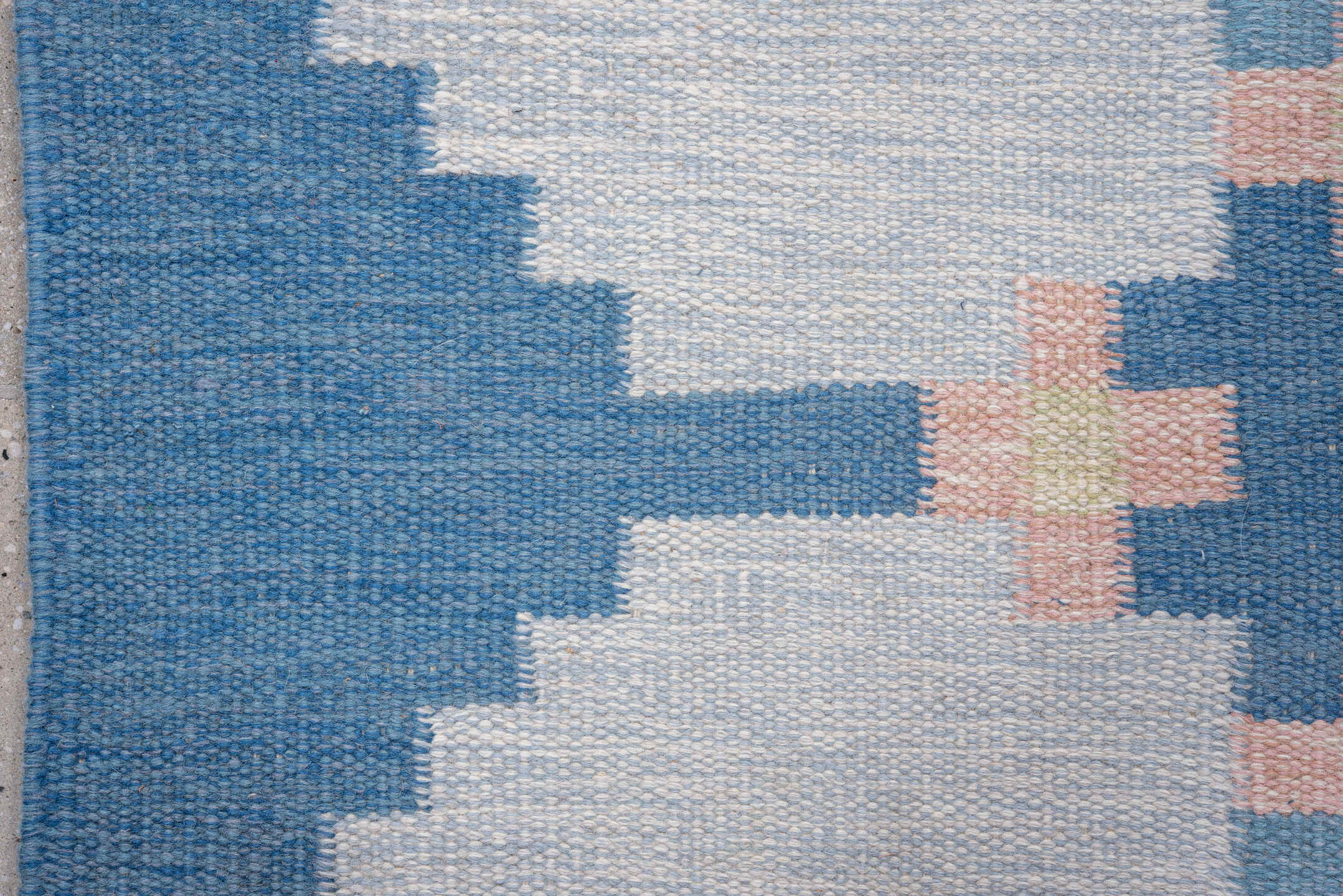 6' x 9' one-of-a-kind handmade vintage Rollaken medium size rug. Color palette: sky blue, ivory, pale blue, blush, cream