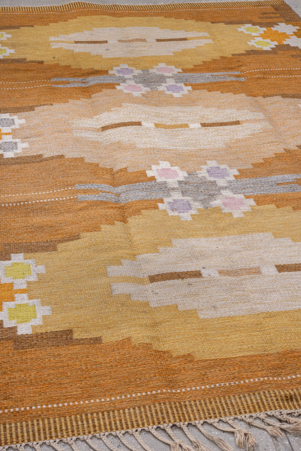 6' x 9' one-of-a-kind handmade antique Rollaken medium size rug. Color palette: camel, ochre, ivory, taupe, saffron, brown