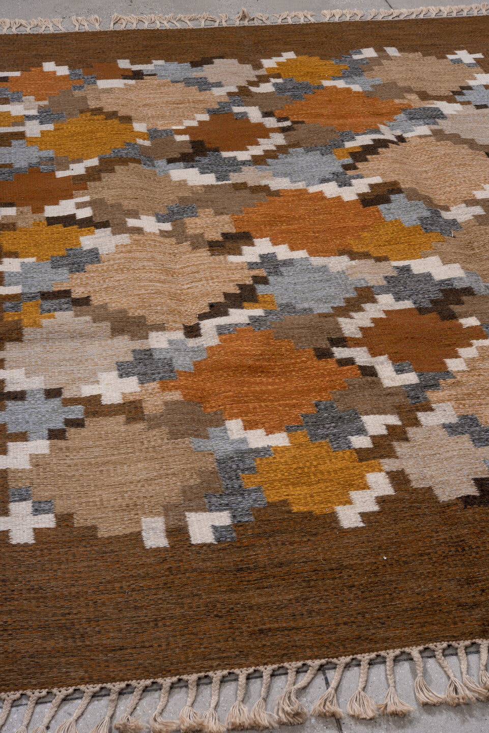6' x 9' one-of-a-kind handmade antique Rollaken medium size rug. Color palette: brown, camel, ivory, rust, ochre, taupe