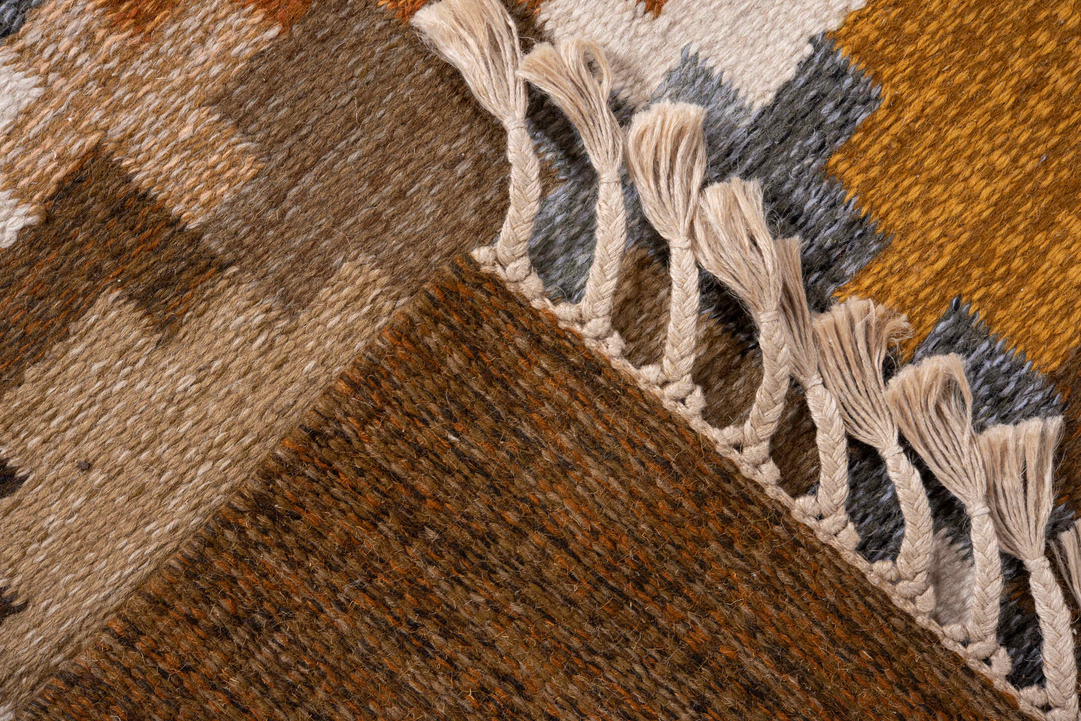 6' x 9' one-of-a-kind handmade antique Rollaken medium size rug. Color palette: brown, camel, ivory, rust, ochre, taupe