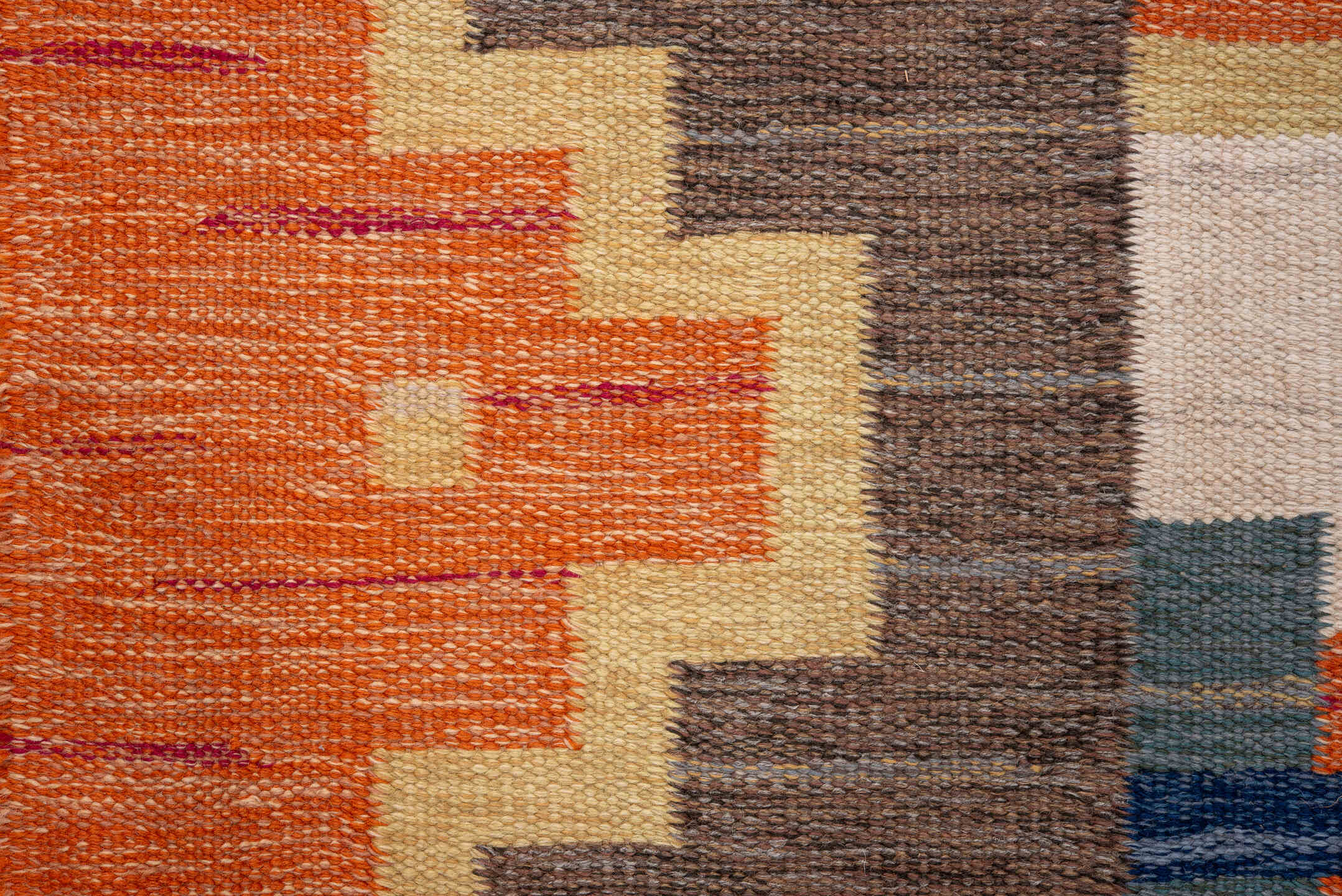 6' x 9' one-of-a-kind handmade antique Rollaken medium size rug. Color palette: orange, ivory, taupe, gold, navy, slate