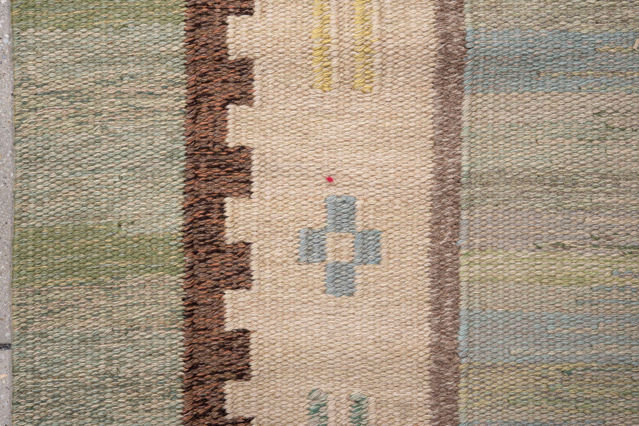 5' x 8' one-of-a-kind handmade vintage Rollaken medium size rug. Color palette: brown, gray, light gray, off-white, pink