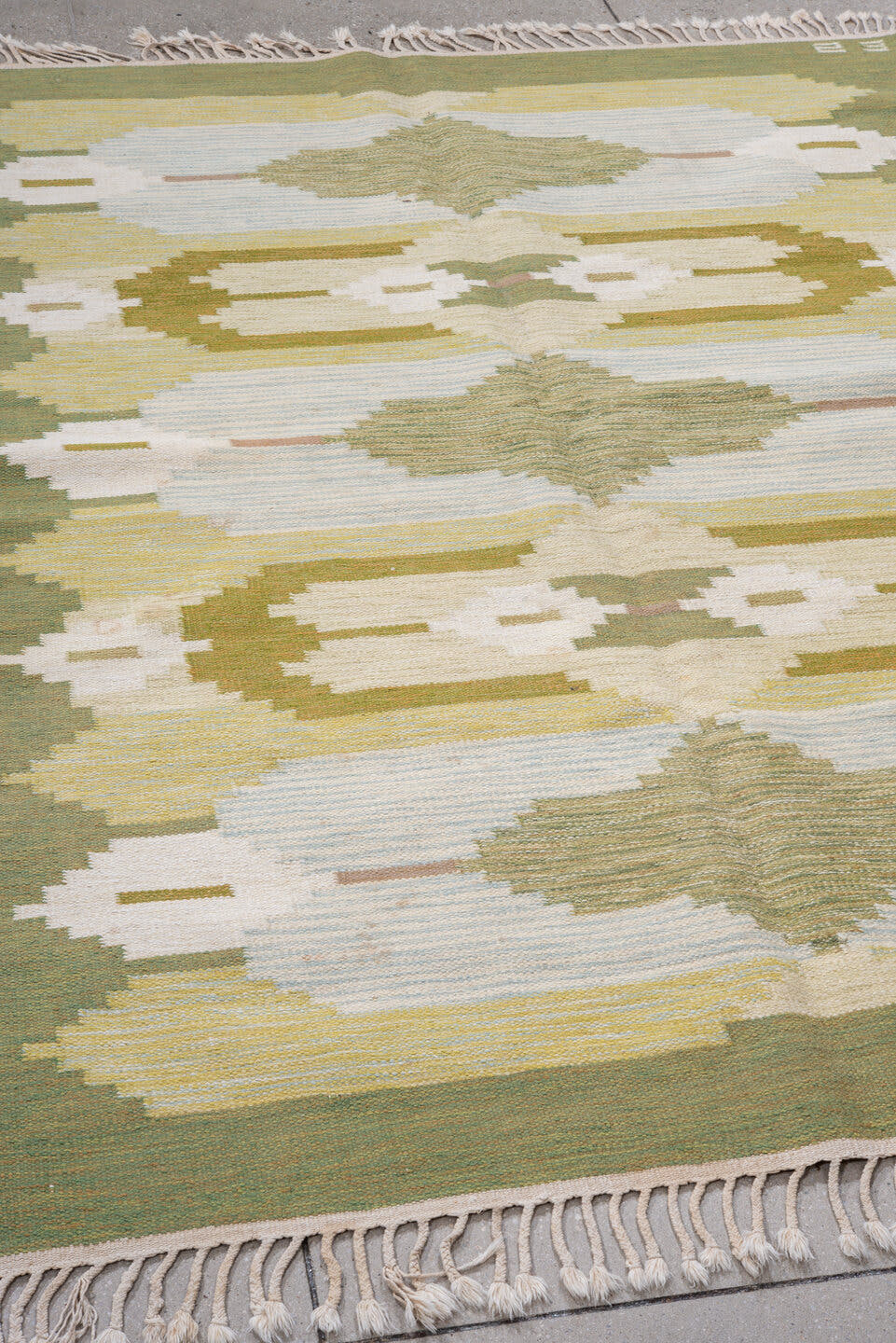 5' x 7' one-of-a-kind handmade antique Rollaken rug. Color palette: olive, ivory, pale_blue, butter_yellow, sage, taupe