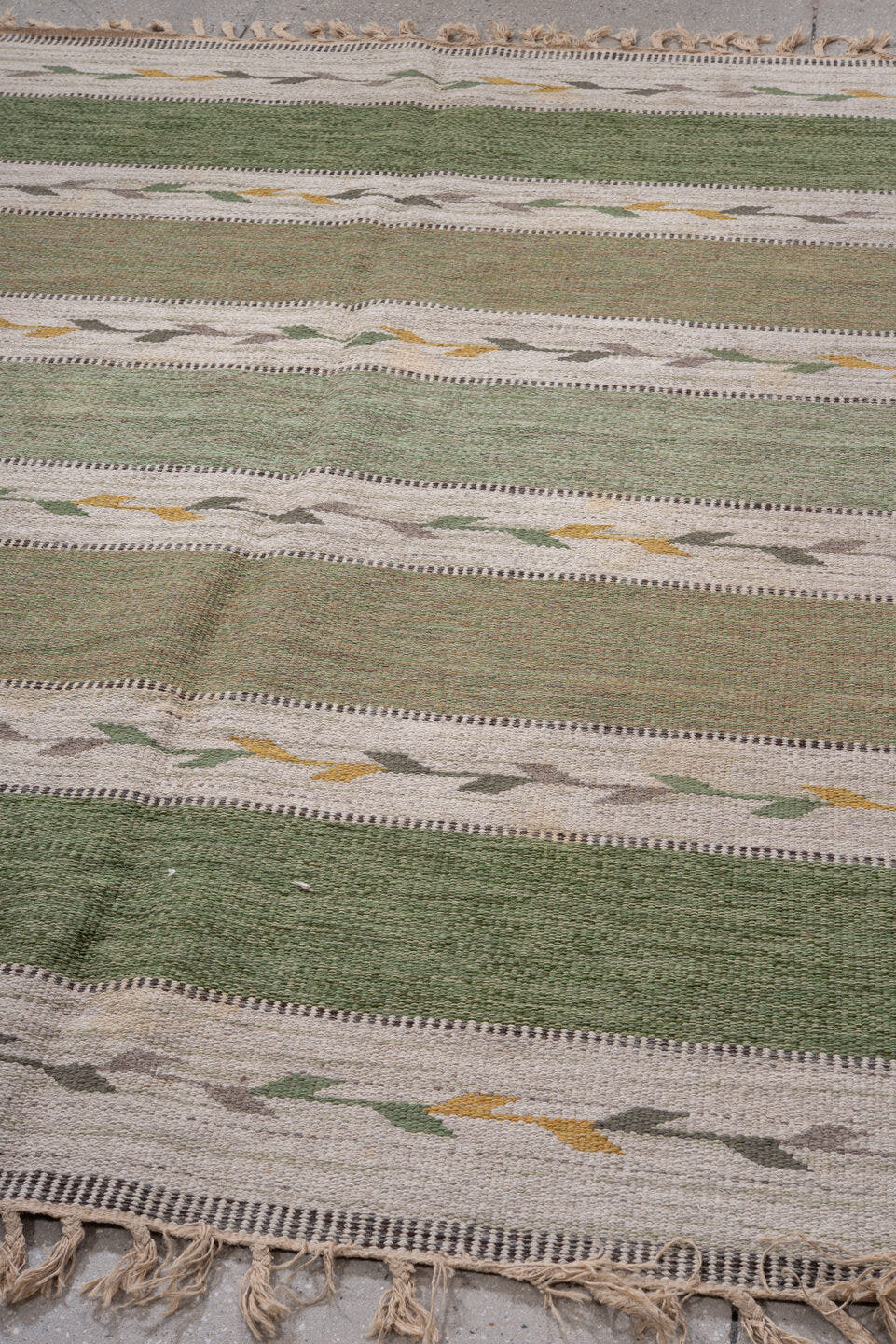 5' x 7' one-of-a-kind handmade antique Rollaken rug. Color palette: olive, ivory, sage, taupe, gold, gray, green, beige