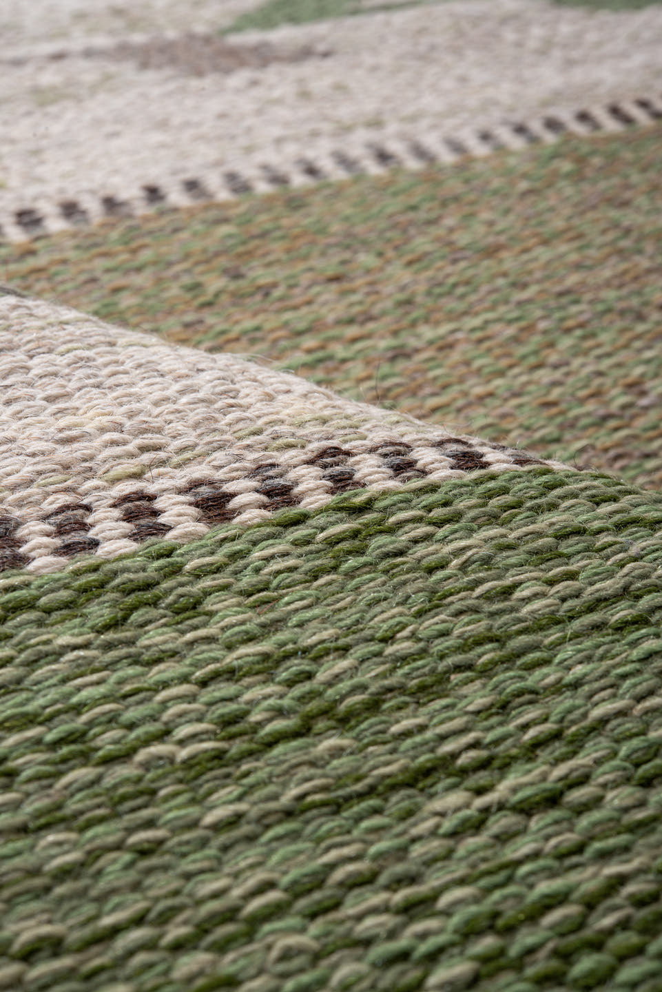 5' x 7' one-of-a-kind handmade antique Rollaken rug. Color palette: olive, ivory, sage, taupe, gold, gray, green, beige