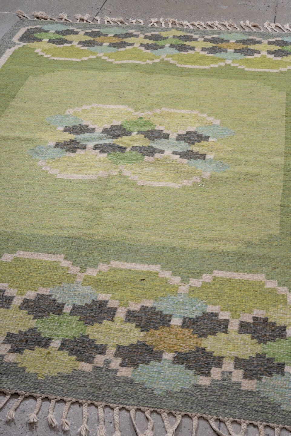 5' x 7' one-of-a-kind handmade antique Rollaken rug. Color palette: sage, pale_green, charcoal, ivory, pale_blue