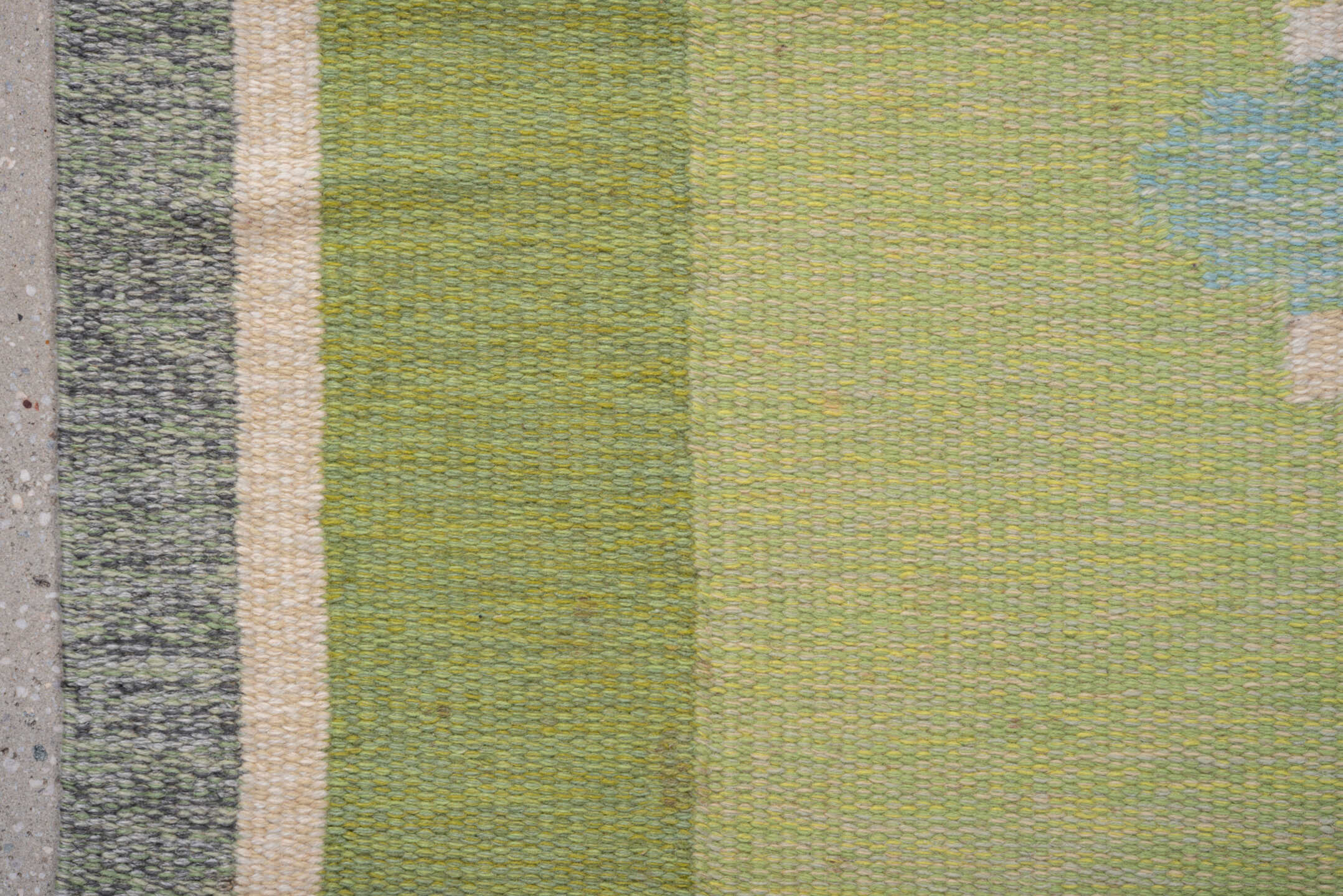 5' x 7' one-of-a-kind handmade vintage Rollaken rug. Color palette: dark khaki, dim gray, gray, green, light gray, off-white