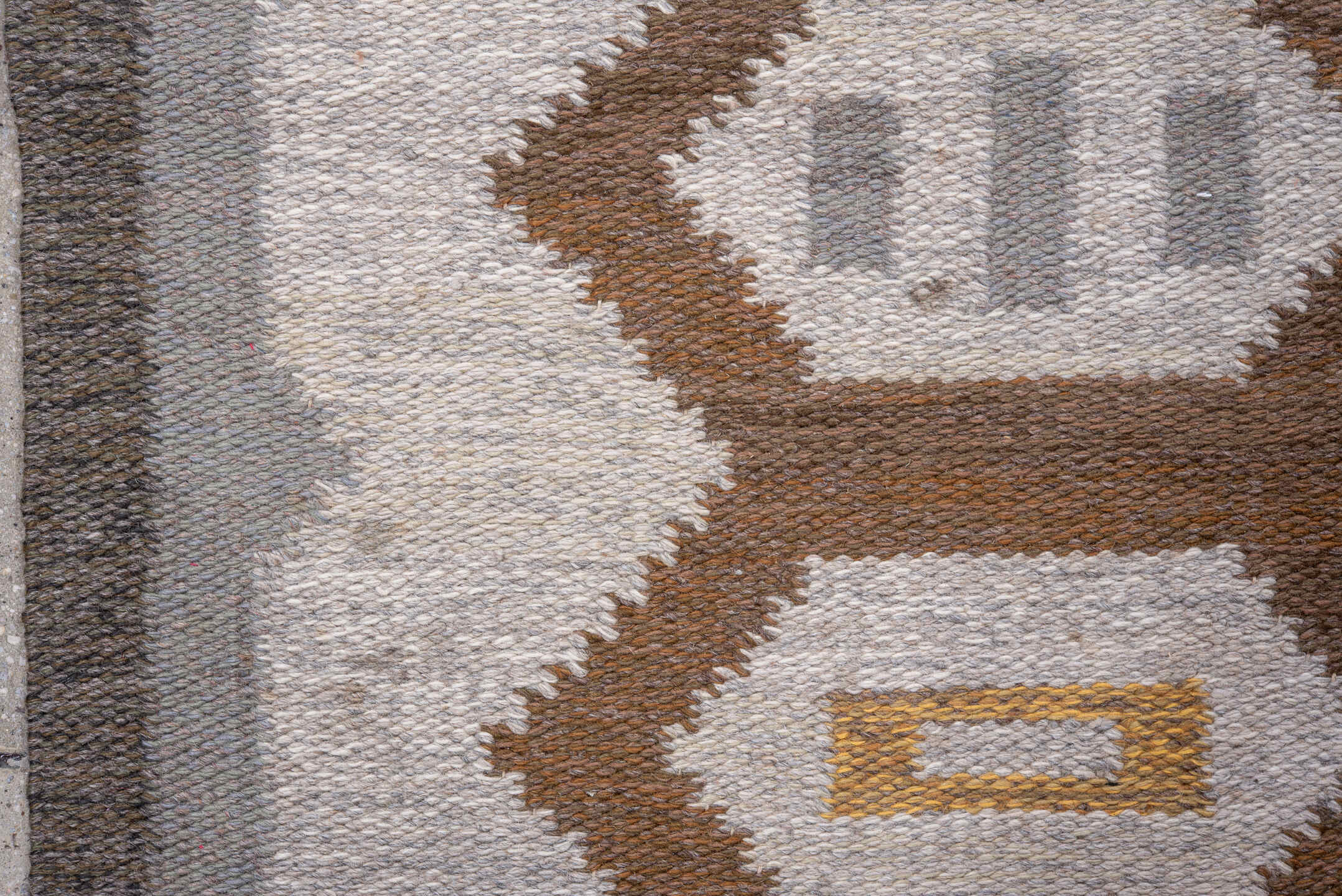 5' x 7' one-of-a-kind handmade antique Rollaken rug. Color palette: brown, ivory, gray, taupe, gold, beige