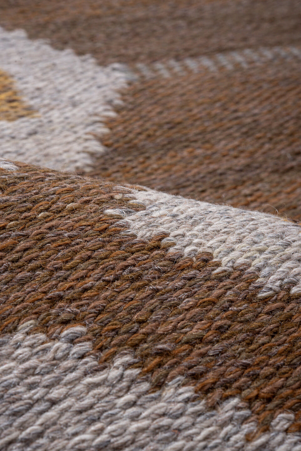 5' x 7' one-of-a-kind handmade antique Rollaken rug. Color palette: brown, ivory, gray, taupe, gold, beige