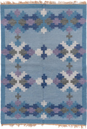 5' x 7' one-of-a-kind handmade antique Rollaken rug. Color palette: sky blue, cornflower blue, navy, ivory, lavender, slate