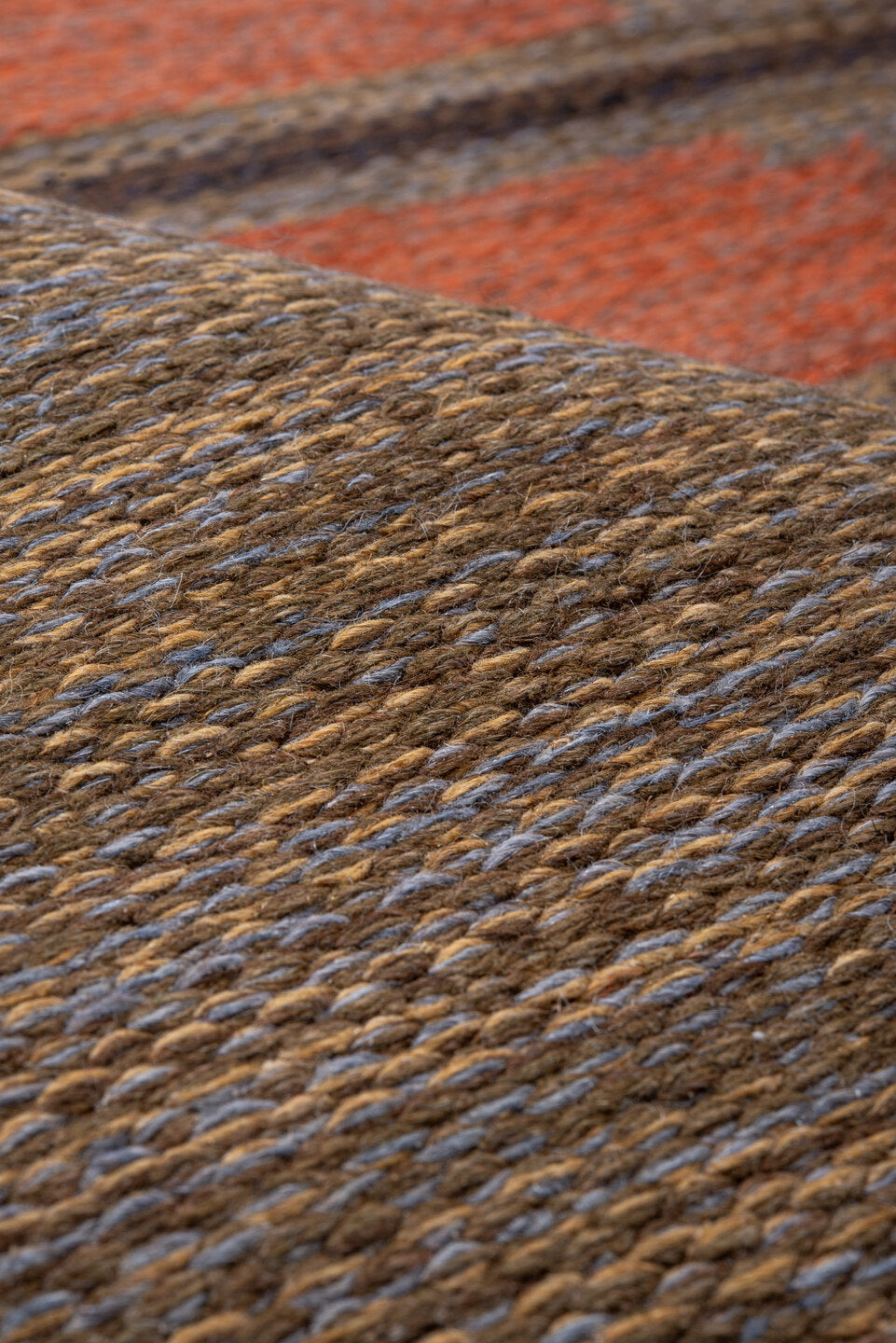 5' x 8' one-of-a-kind handmade vintage Rollaken medium size rug. Color palette: brown, dark salmon, gray, light gray