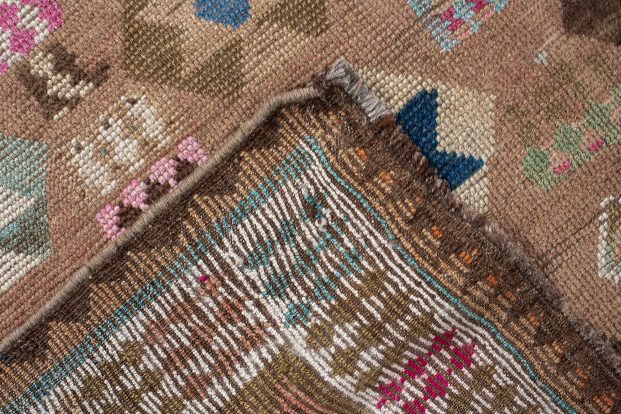 4' x 7' one-of-a-kind handmade vintage Gabbe rug. Color palette: camel, ivory, brown, turquoise, magenta, taupe, navy, rose