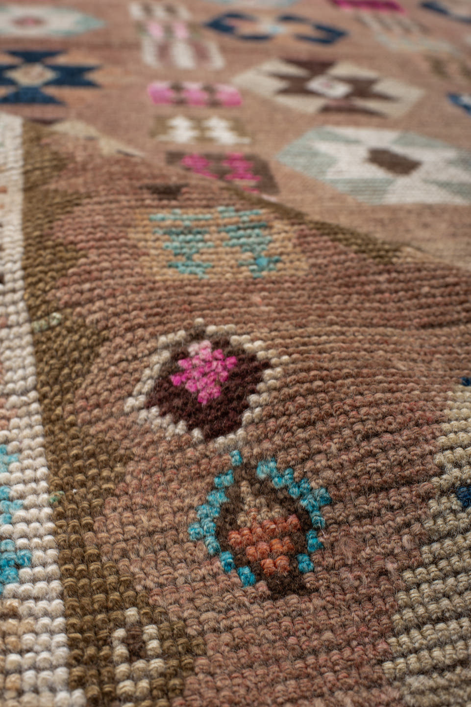 4' x 7' one-of-a-kind handmade vintage Gabbe rug. Color palette: camel, ivory, brown, turquoise, magenta, taupe, navy, rose
