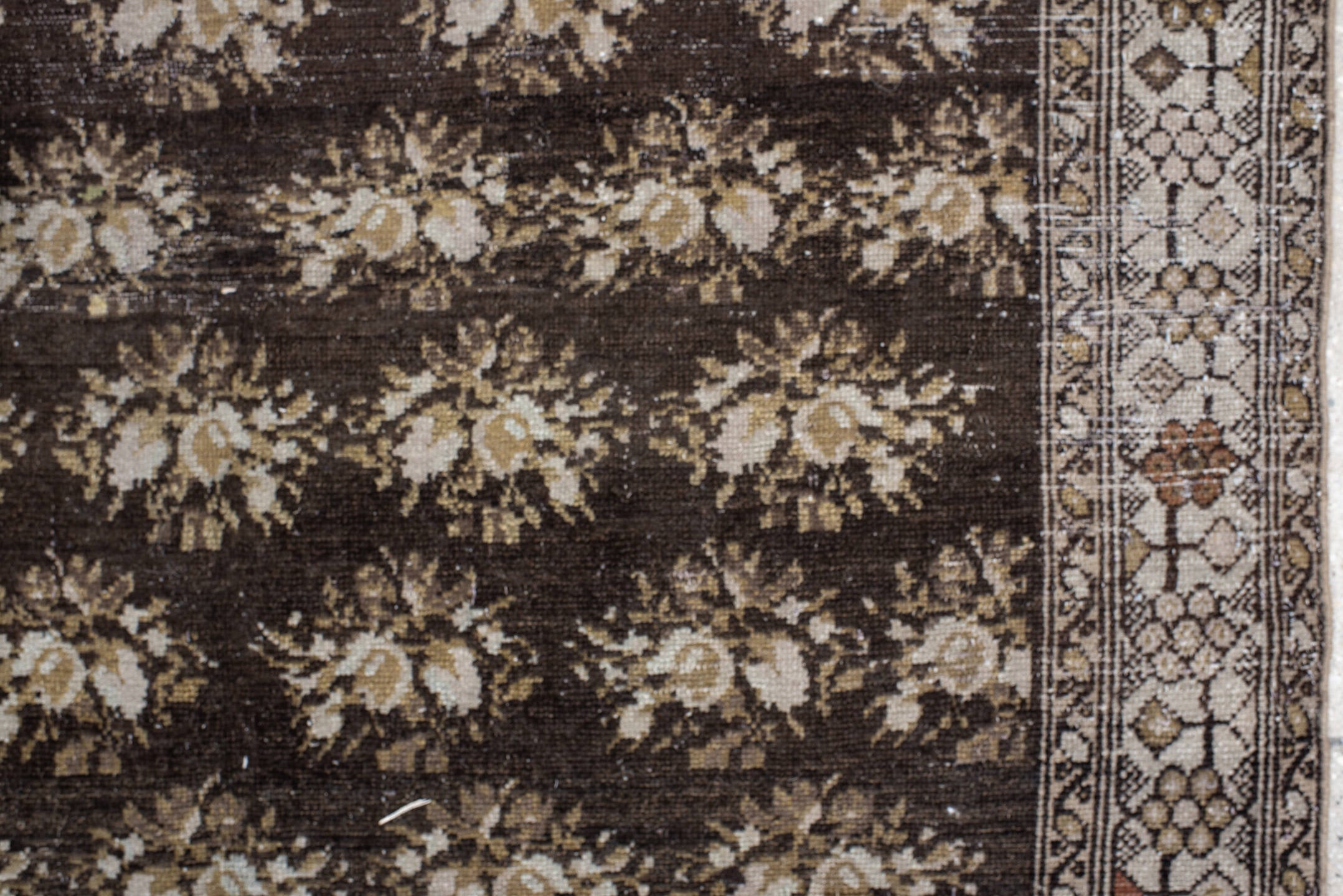 4' x 7' one-of-a-kind handmade vintage  rug. Color palette: brown, ivory, taupe, camel, charcoal, gold, rust, beige, gray