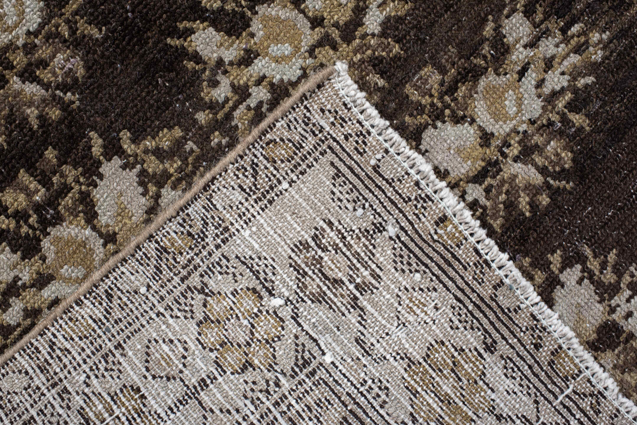 4' x 7' one-of-a-kind handmade vintage  rug. Color palette: brown, ivory, taupe, camel, charcoal, gold, rust, beige, gray